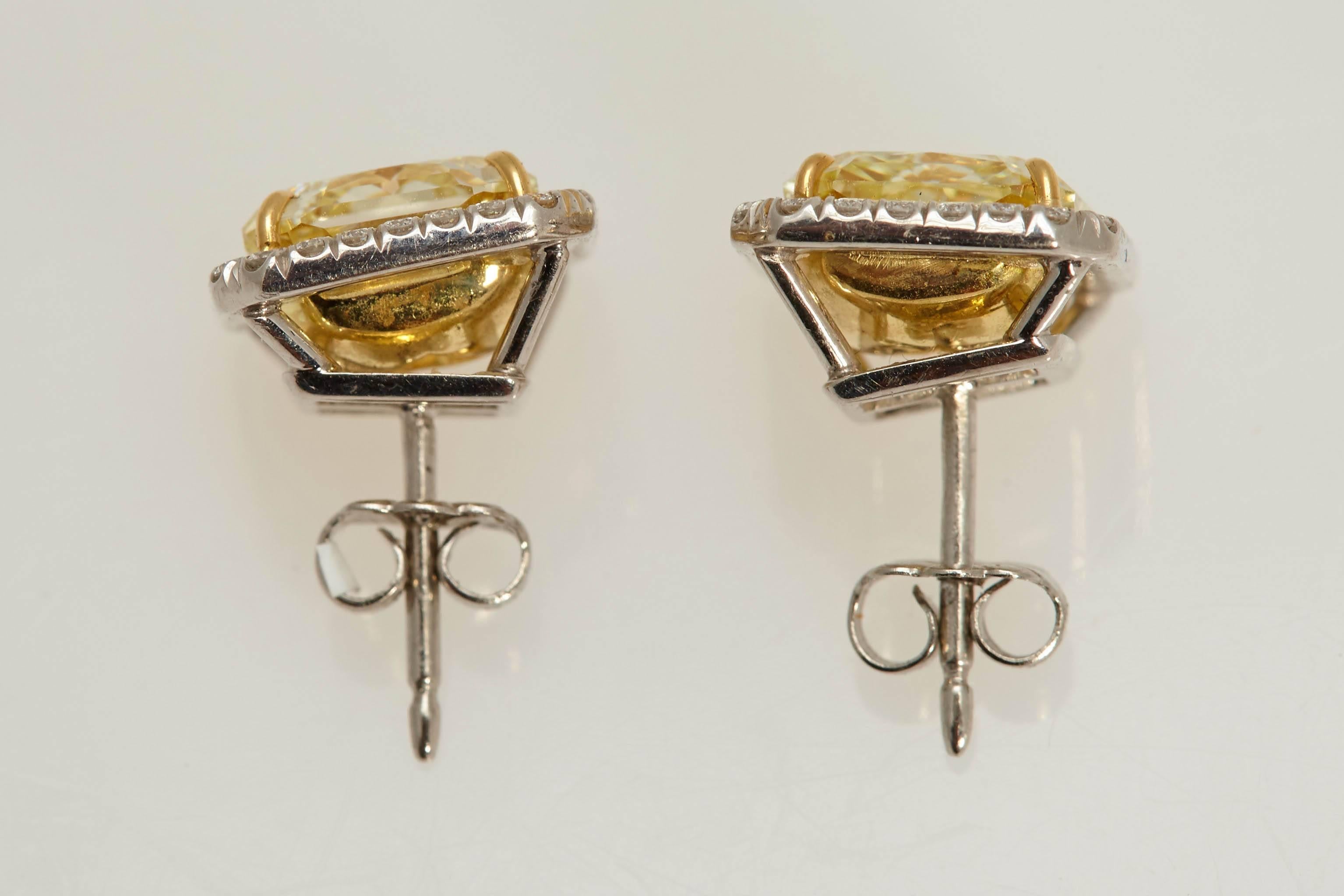 Radiant GIA Fancy Yellow Diamond Earrings 6.61 Carat In Excellent Condition For Sale In New York, NY