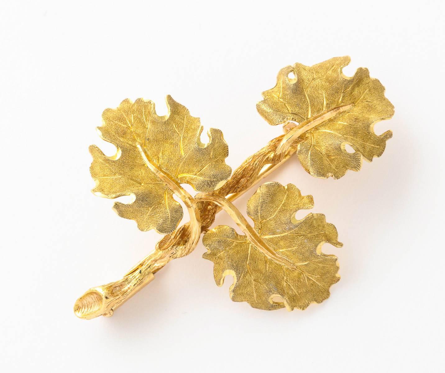 Buccellati 18k yellow gold textured leaves on vine like stems
1 3/4 inch long
1 1/4 inch wide
6.7 grams

