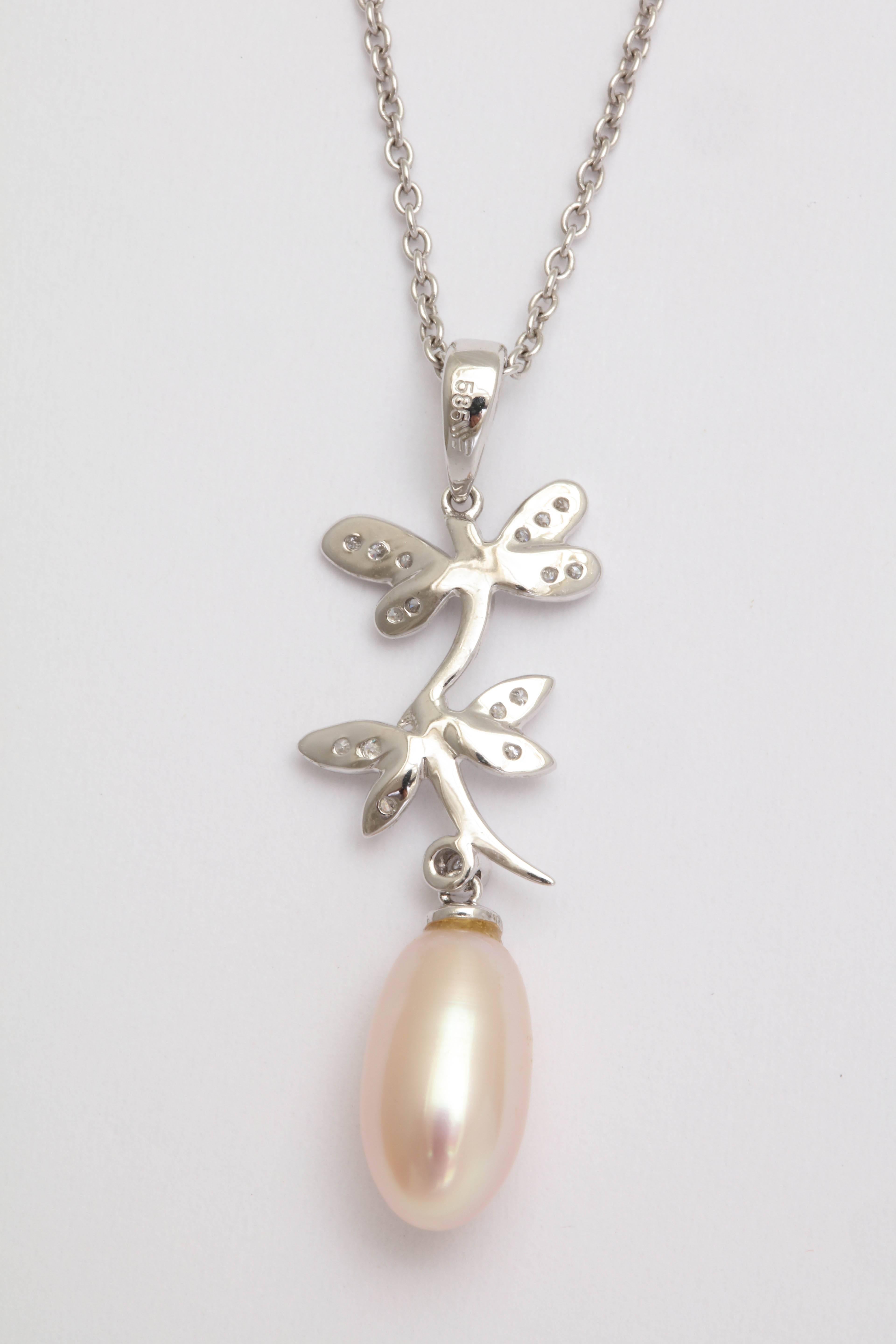 Modern Lovely Diamond, Gold and Pearl Dragonfly Pendant For Sale