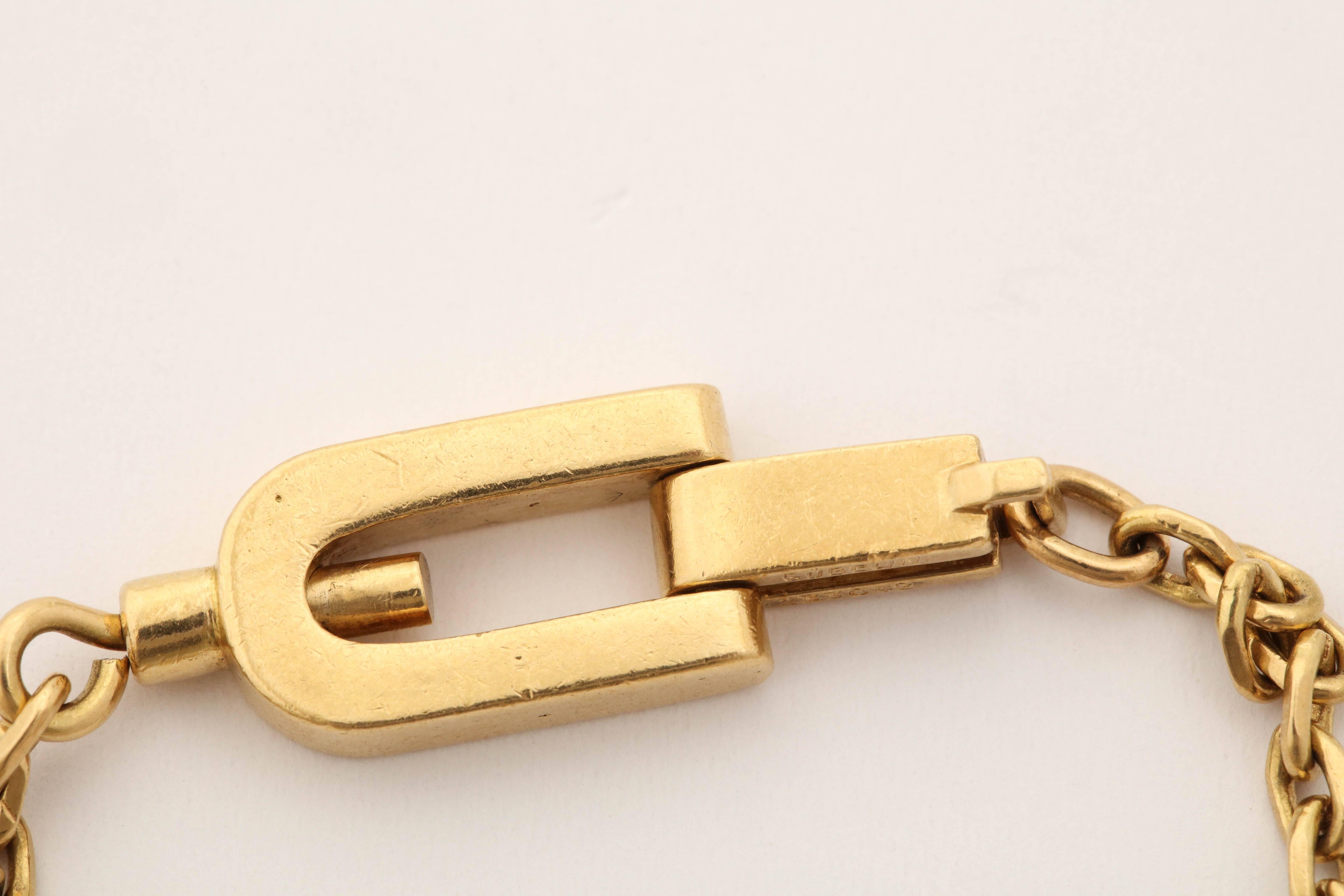 One 18kt Gold Open Link Unisex Key Chain With A Beautiful And Unique 18kt Gold Clasp And Lock. This Is A True One Of A Kind Key Chain,Made In France And Created By Gubelin Jewelers In The 1950's.Signed And Stamped With Serial #233042.