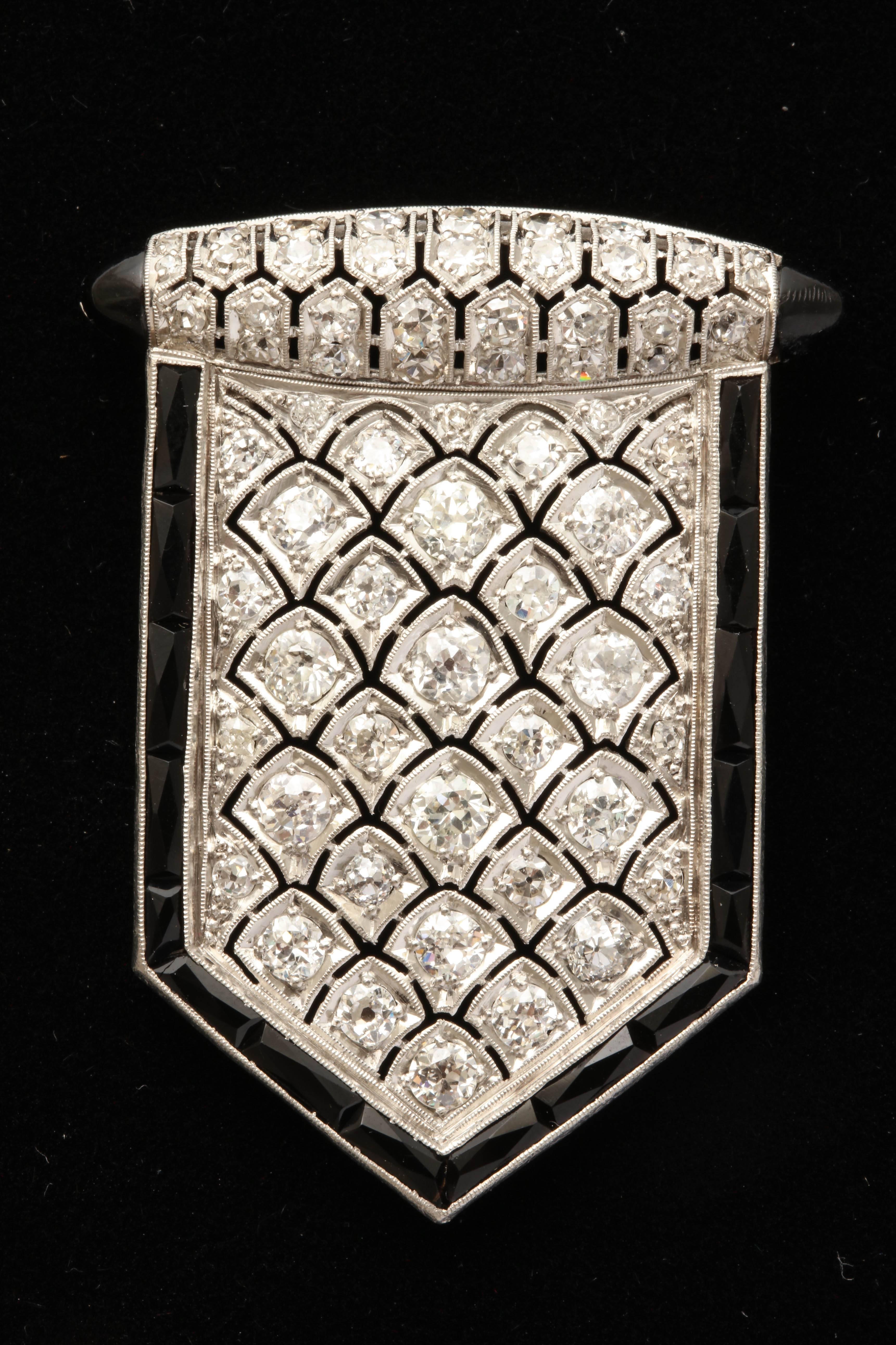One Large Ladies Shield Shape  Honey Comb And Beehive Pattern Diamond Set Pendant Embellished With Approximately Four Carats Total Weight Of Antique Cut Diamonds. Pendant Is Further Flanked On The Edges With Numerous French Cut Black Onyxes. Two