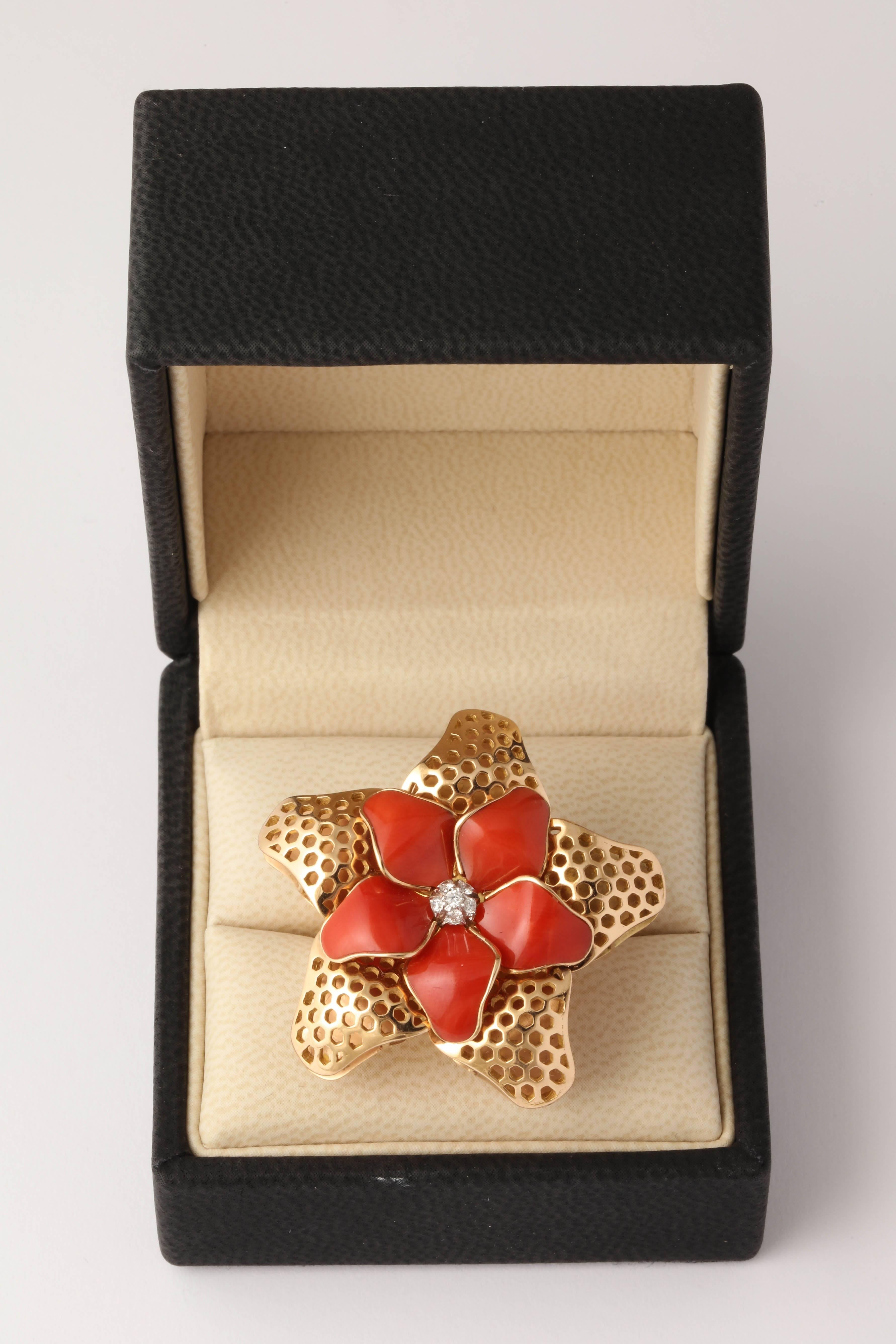 One 18kt Gold Made In France Large Custom Cut Coral and Diamond Figural Starfish And Pin Wheel Deign Flower Ring With Five Custom cut Beautiful Color Coral Pieces . Gold Work Magnificently Made With Reticulated Texture Within The Ring. Current Size