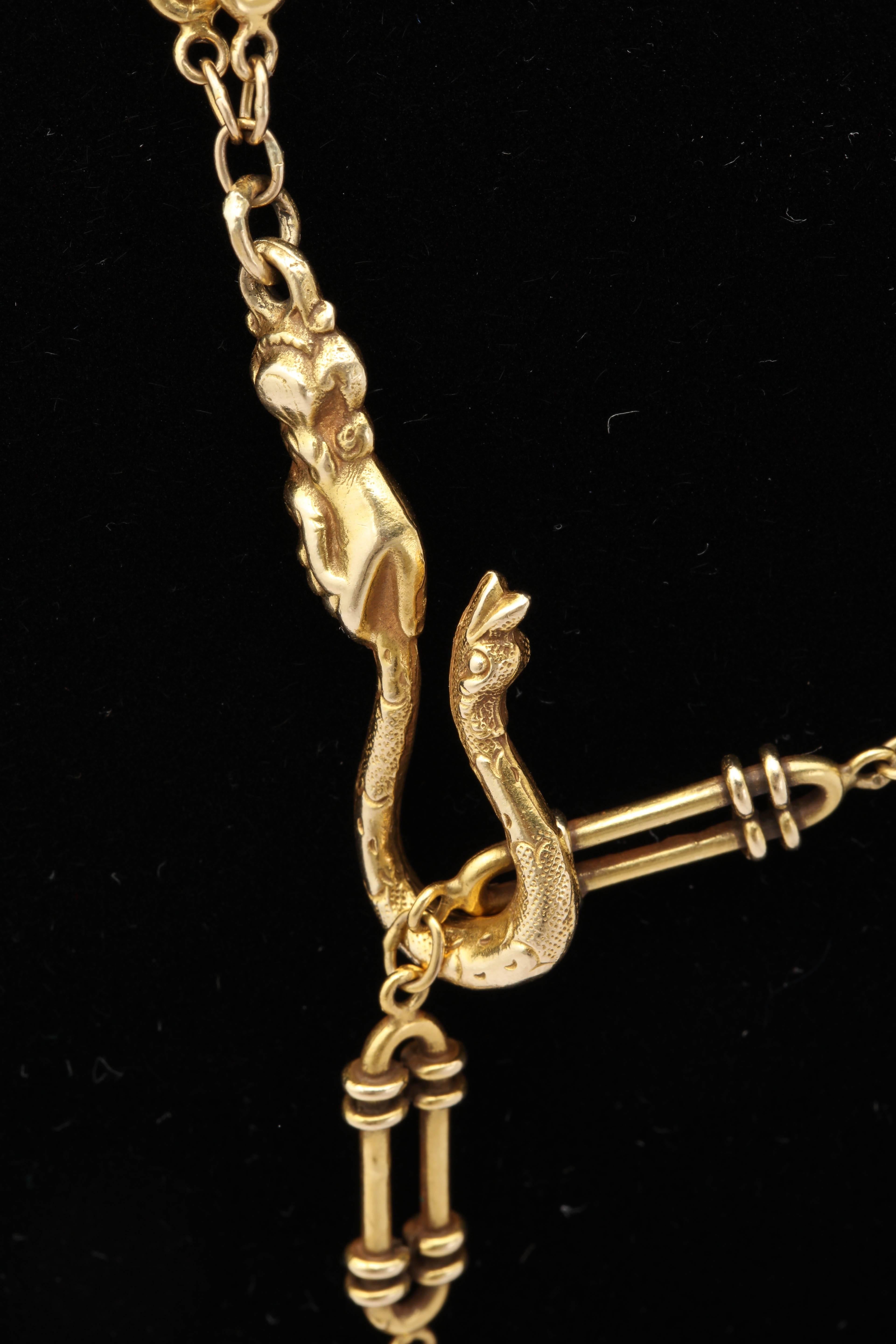 1930s Long Oblong Open Link Figural Hand Holding Snake Clasp Gold Chain In Excellent Condition In New York, NY