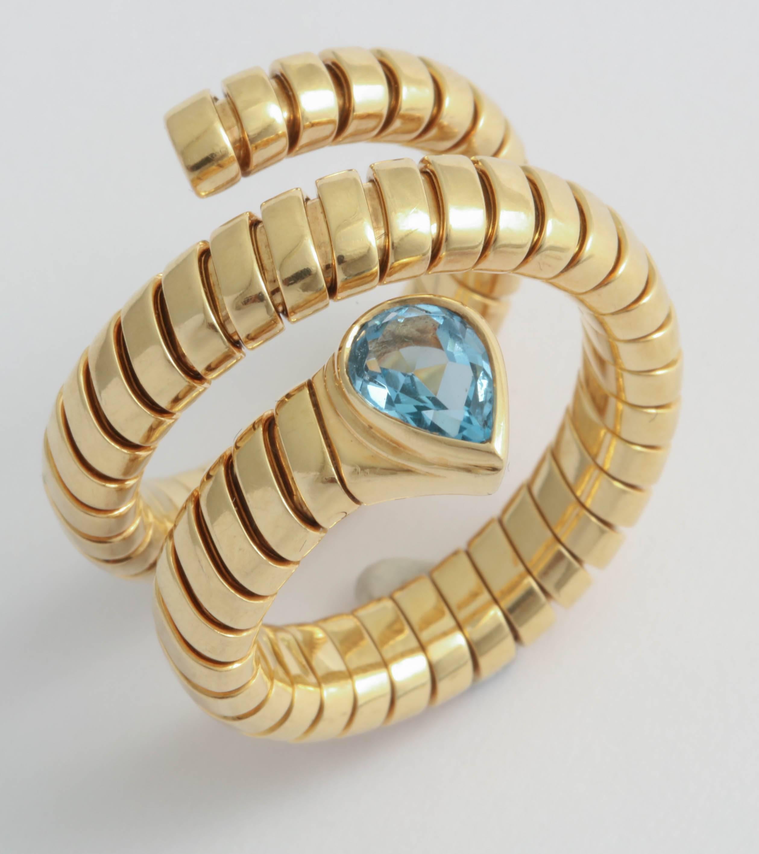 Beautiful Turbogas Snake Ring set with Marquise shaped Blue Topaz. Signed Bulgari - Italy - 750 w Italian Control marks.  A real vintage look!  Bulgari- can't be bad - try to find one.