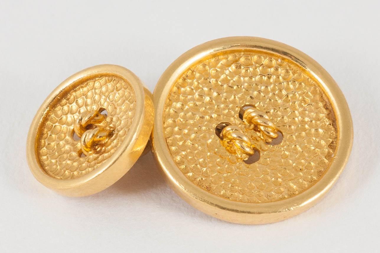 A fine pair of circular button cufflinks of two sizes, signed Pomellato in 18ct yellow gold.The colour and patina is excellent,chain link connections.c,1980