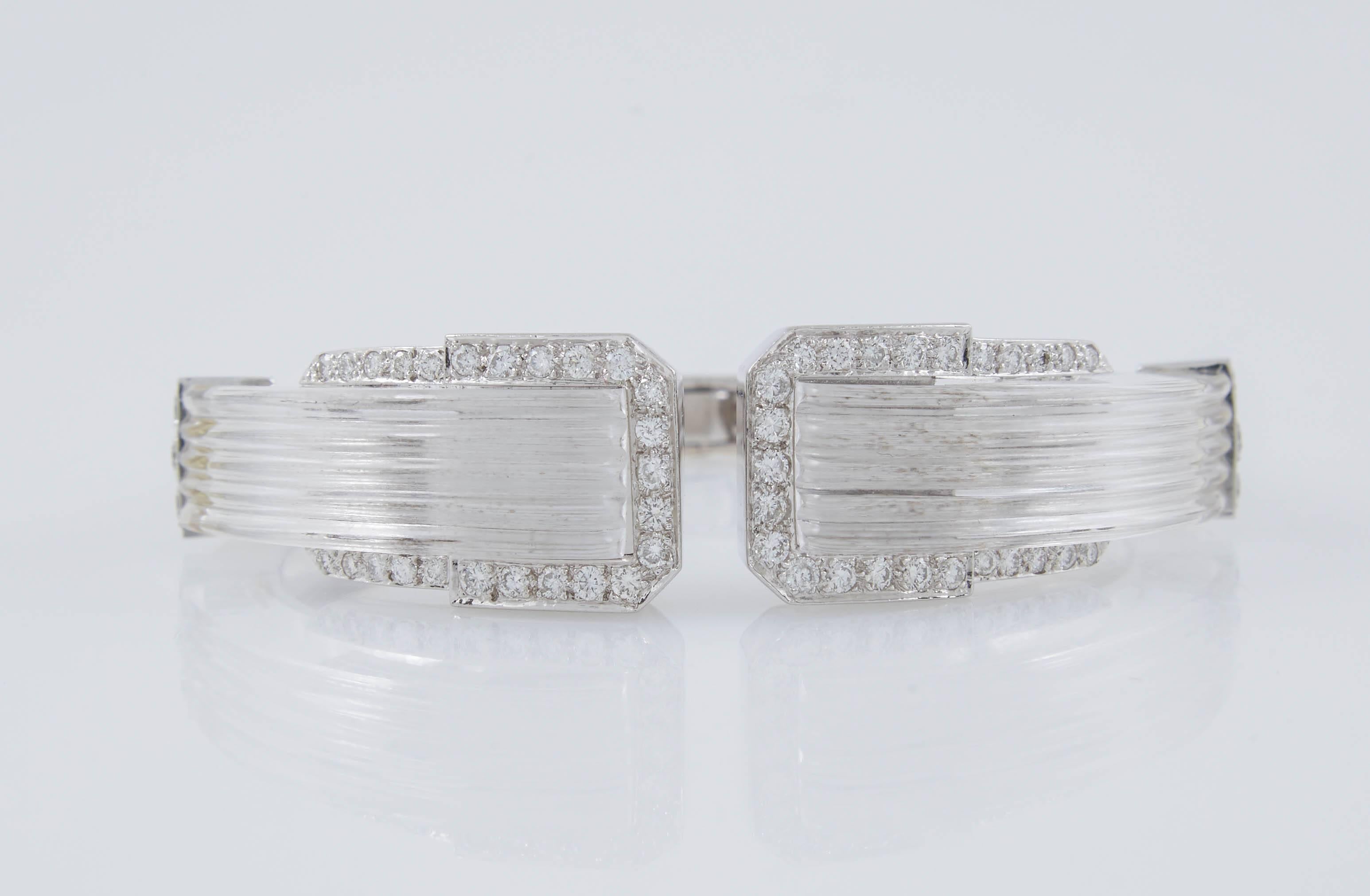 Carved Rock Crystal cuff bracelet, finely crafted in 18k white gold and platinum accented with Round Brilliant cut diamonds, signed David Webb.