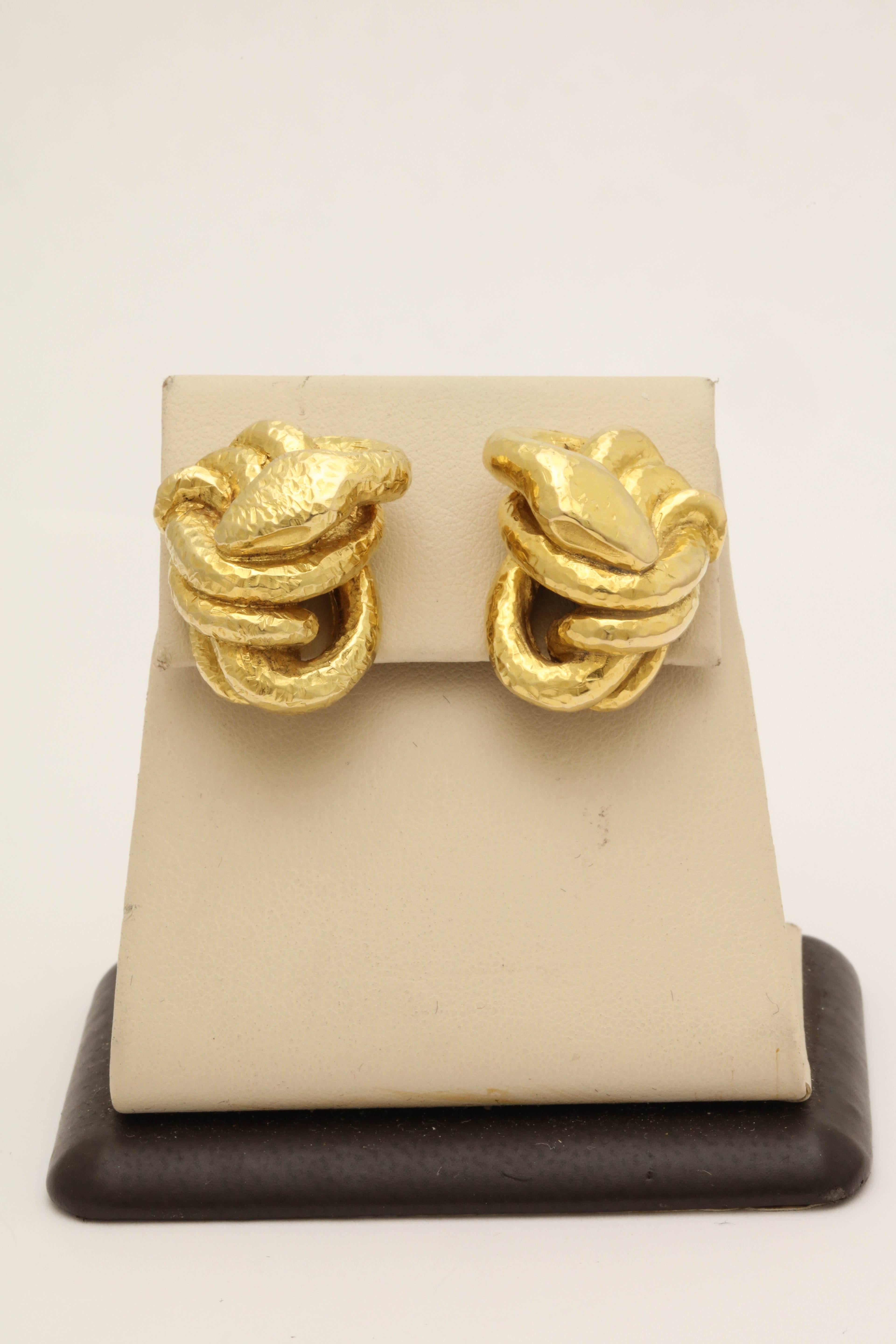 One Pair Of Ladies Figural Snake 18kt Yellow Gold Earrings Designed In A Wrapped Around Coil Serpent Design And Using A Hand Hammered Gold Craftmanship, These Earrings Are Very Special and Unique and Have High Quality Fancy Heavy Clip On Backs.