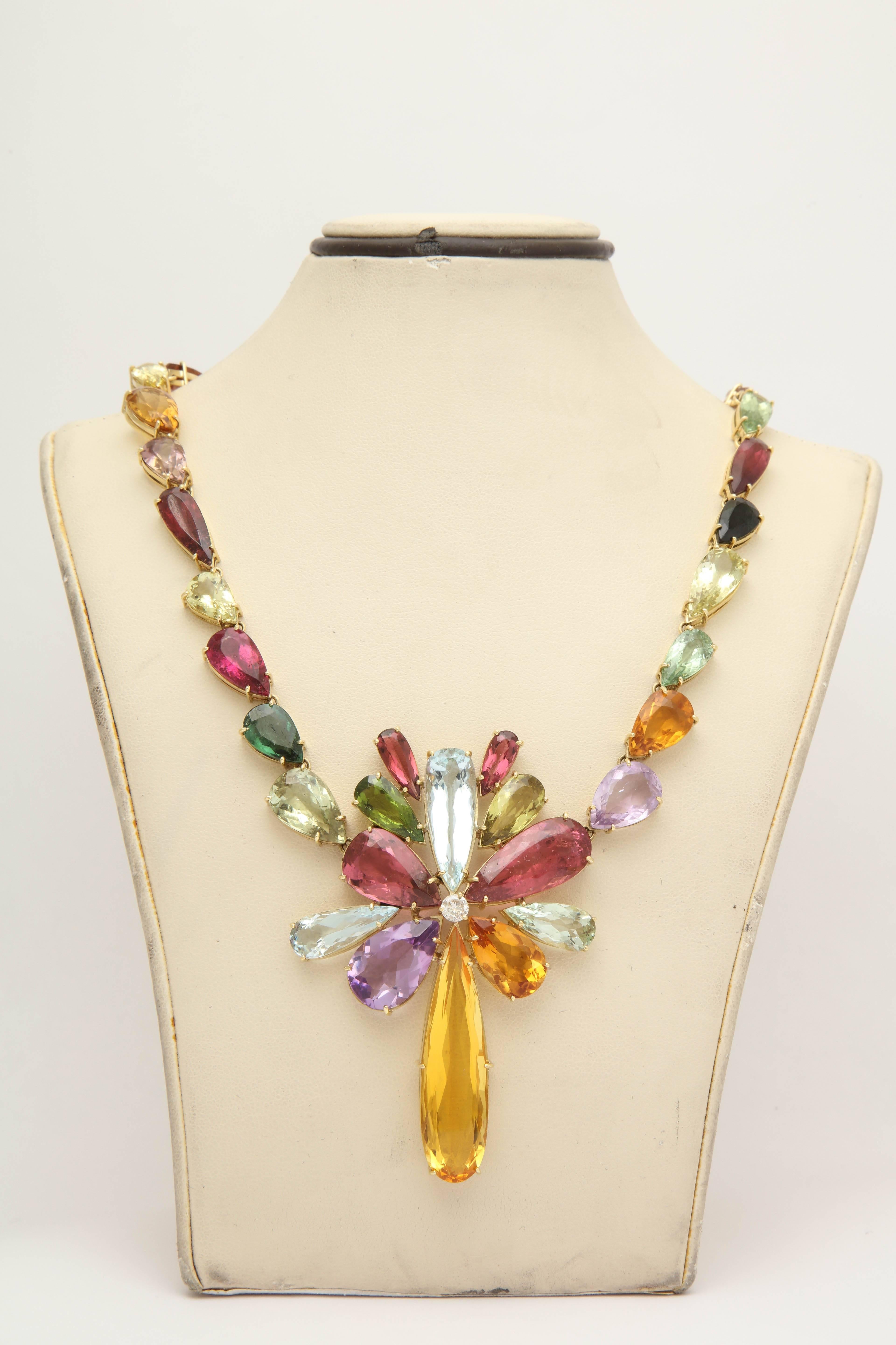 One Ladies Multicolored Stone Necklace Designed With 195 Carats Of Semi Precious Stones Consisting Of Pear Cut Aquamarines,Citrines Pink Tourmalines,Green Tourmalines,Amethysts And Garnet Stones Thruout.The Neckpiece Is Centering a .25 carat High