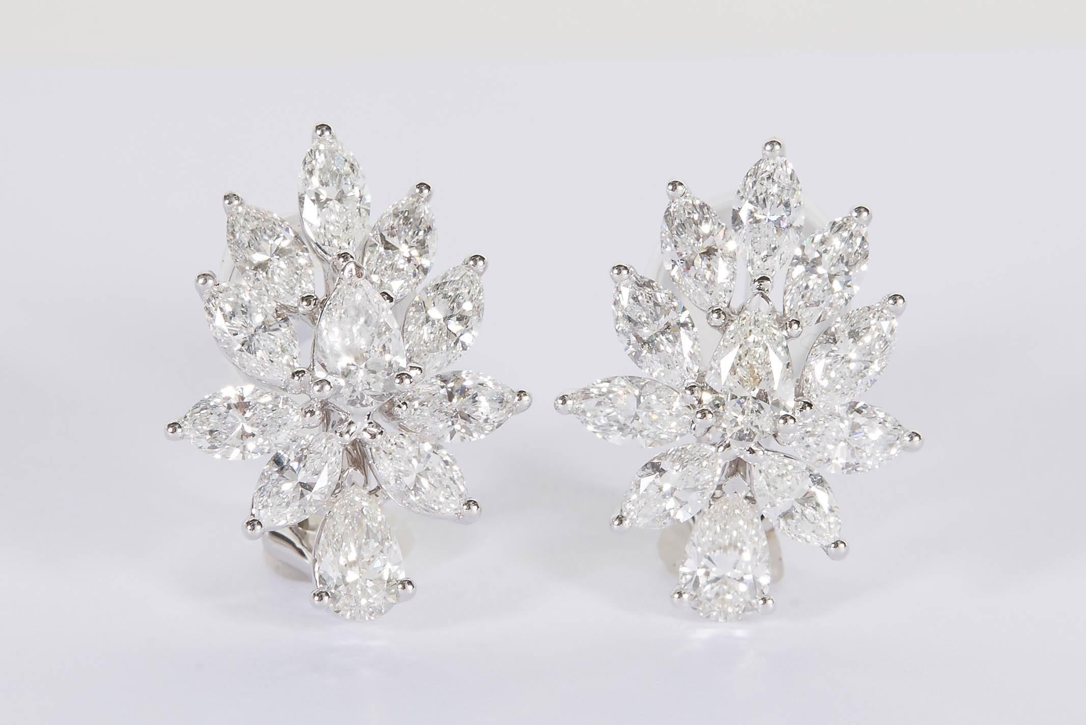 

A beautiful pair of timeless cluster earrings.

4.93 carats of beautiful white VS pear and marquise cut diamonds set in 18k white gold. 

Approximately .85 inches tall, just over half an inch at its widest points. 

A great earring to add to any