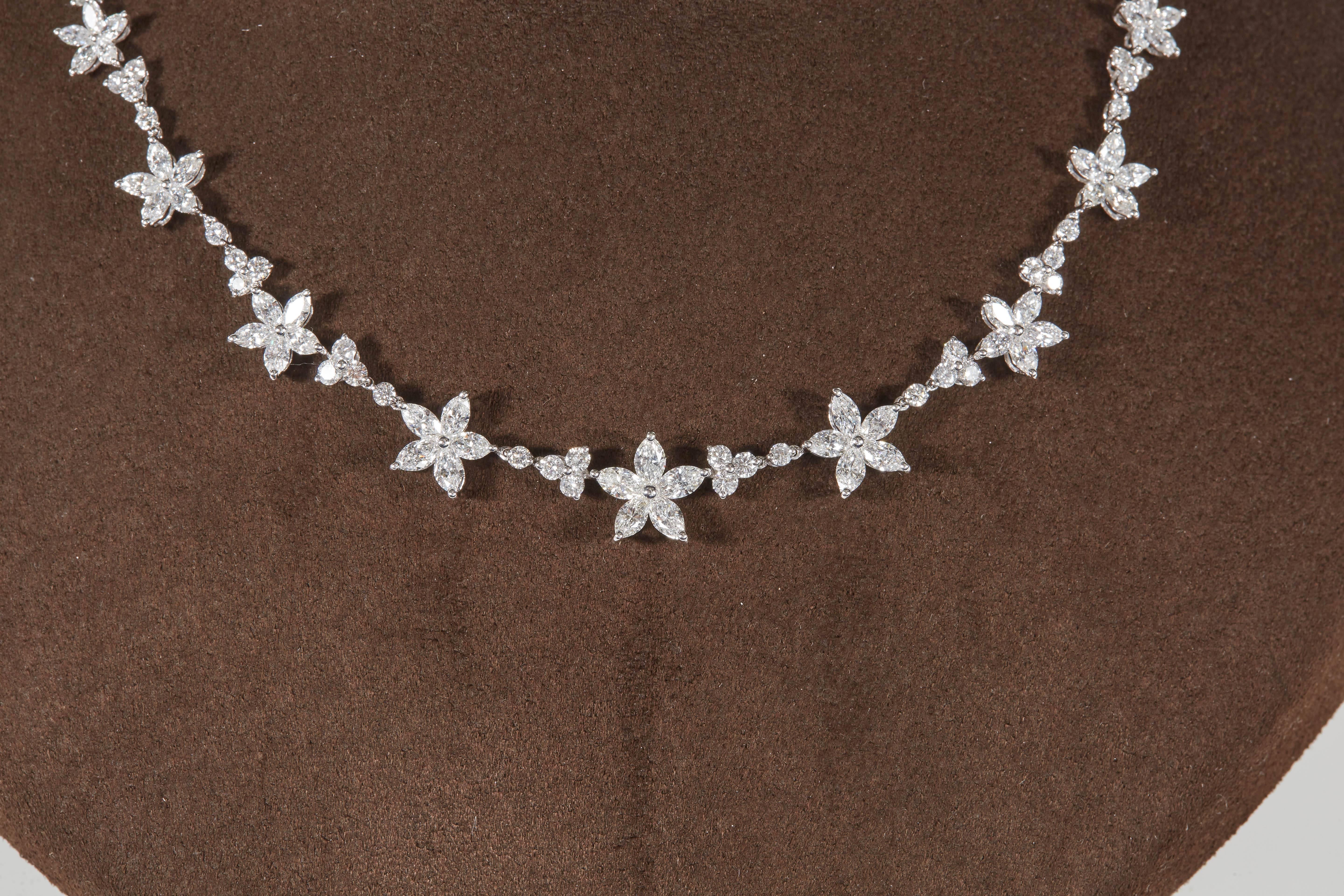 
An elegant diamond necklace featuring marquise and round brilliant cut diamonds. 

8.12 carats of white VS diamonds. 

18k white gold

Approximately 15.25 inch length, the length can be adjusted. 


