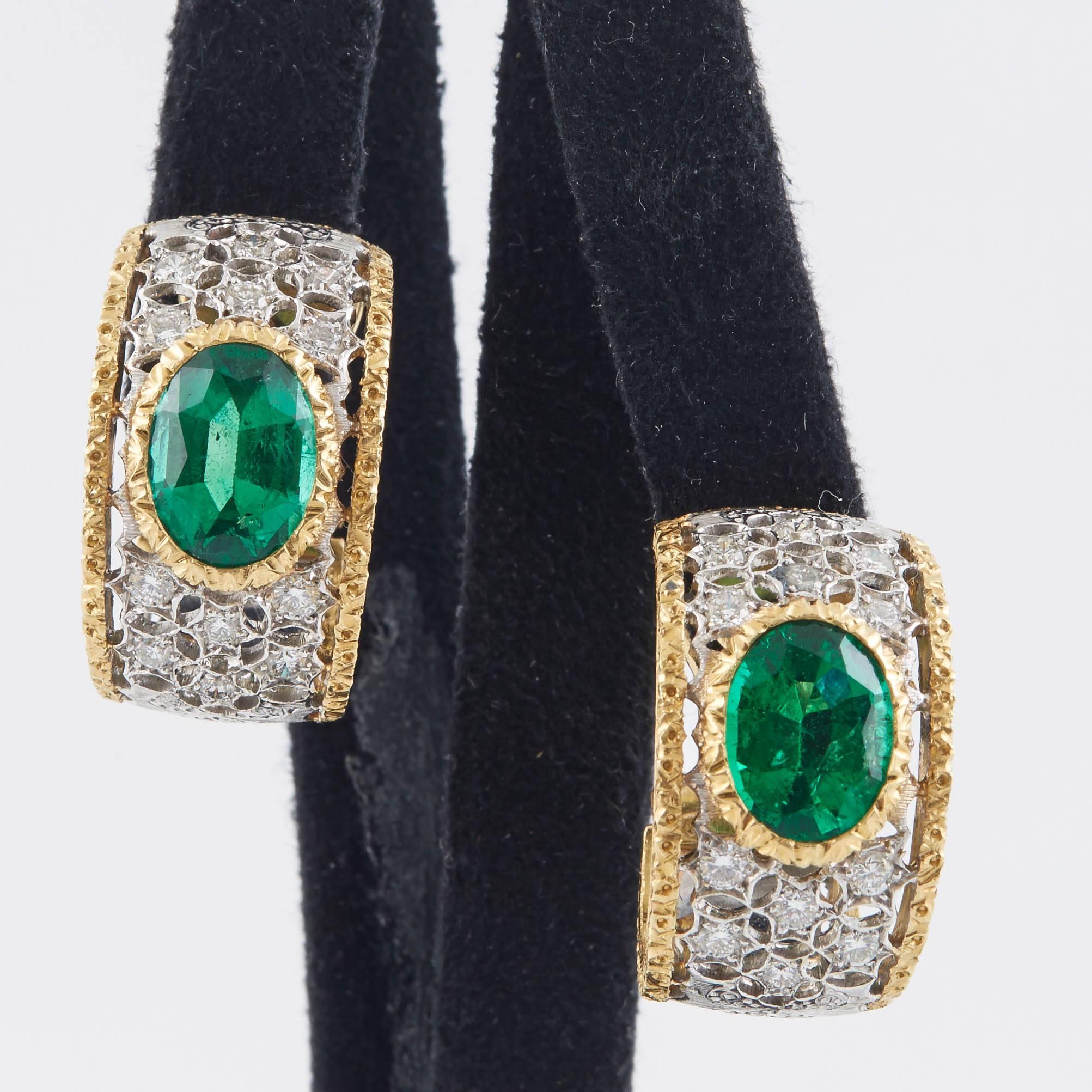 Large and gorgeous Mario Buccellati Diamond and Emerald ear clips. Each earring is centered with a large faceted emerald approx 2.50 carat. 