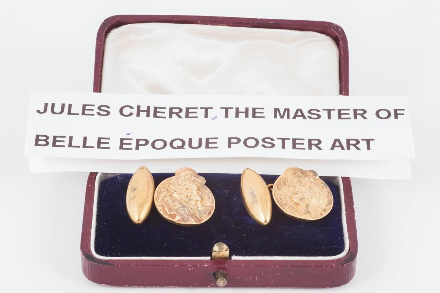 An interesting pair of antique cufflinks in carved 18 karat yellow gold from the Art Nouveau period. Single sided with a women with flowing hair on one face and wearing a theatrical mask on the other. Signed by Jules Cheret, the master of Belle