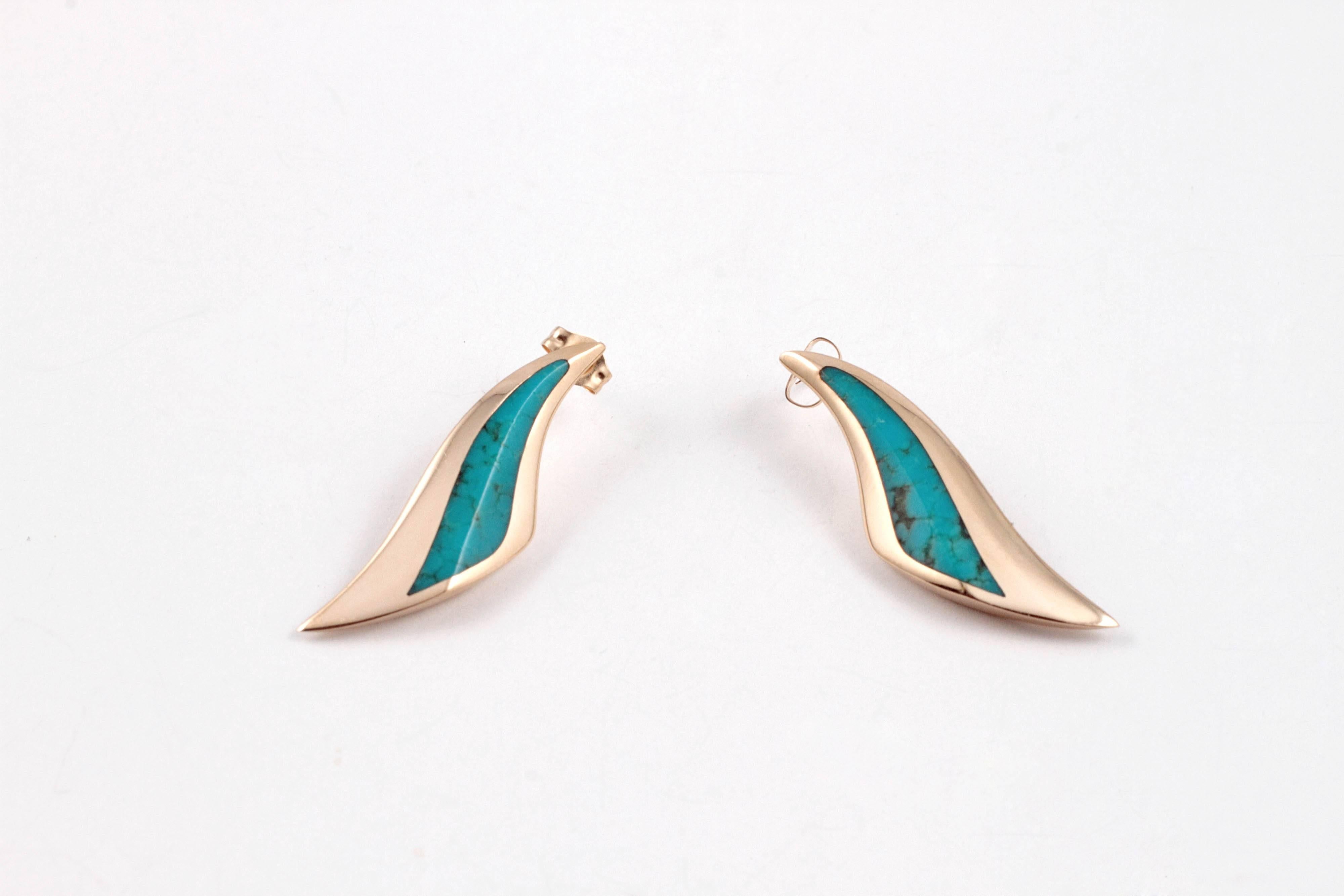For the turquoise lover, Kabana is tops!  These stunning earrings measure 1 1/4 inches in length, are secured with a standard friction back and are long and lovely!  