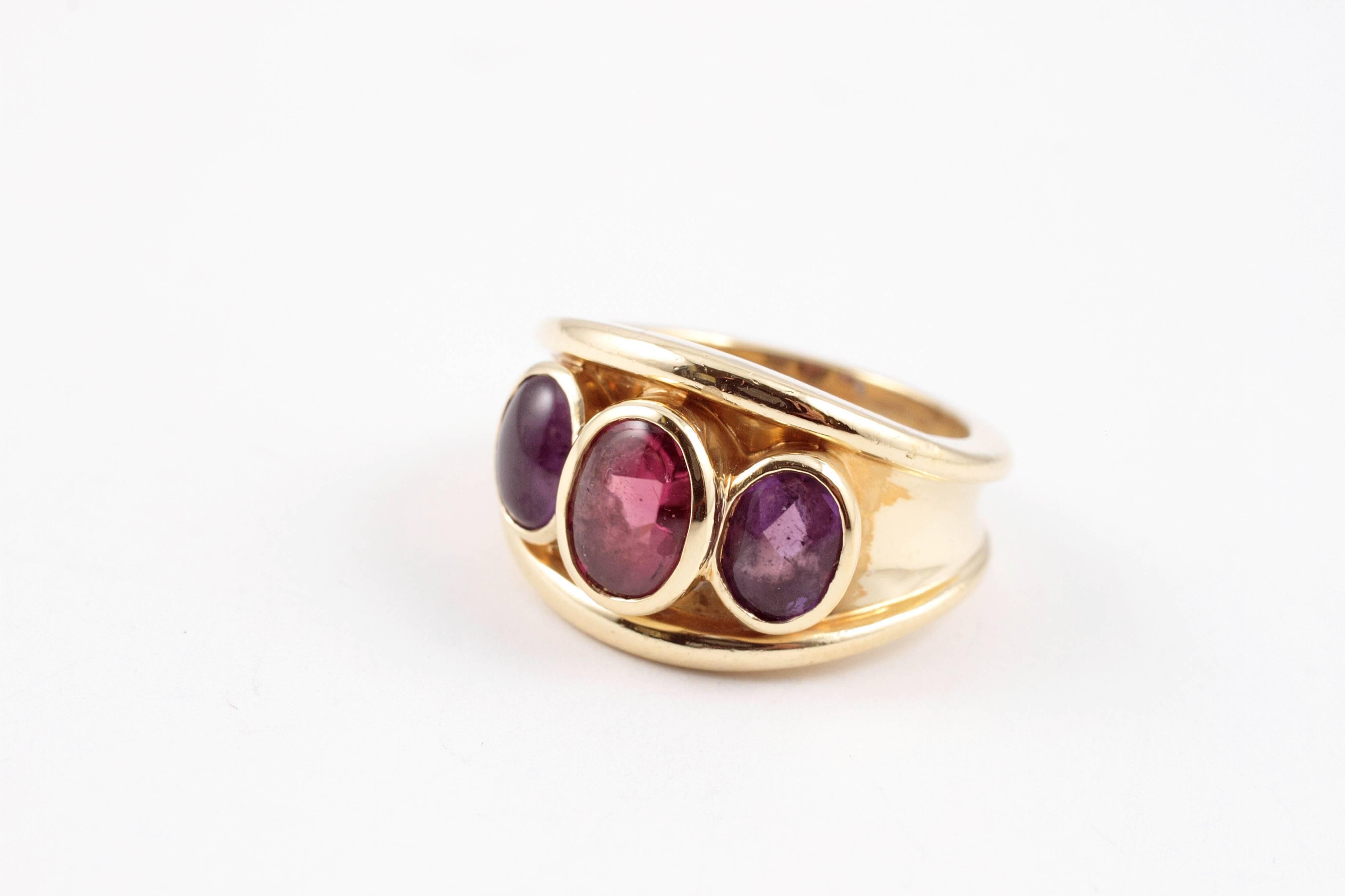 Popping Color!  In 18 karat yellow gold, warm purple and pink colors that just jump off your finger! Size 7