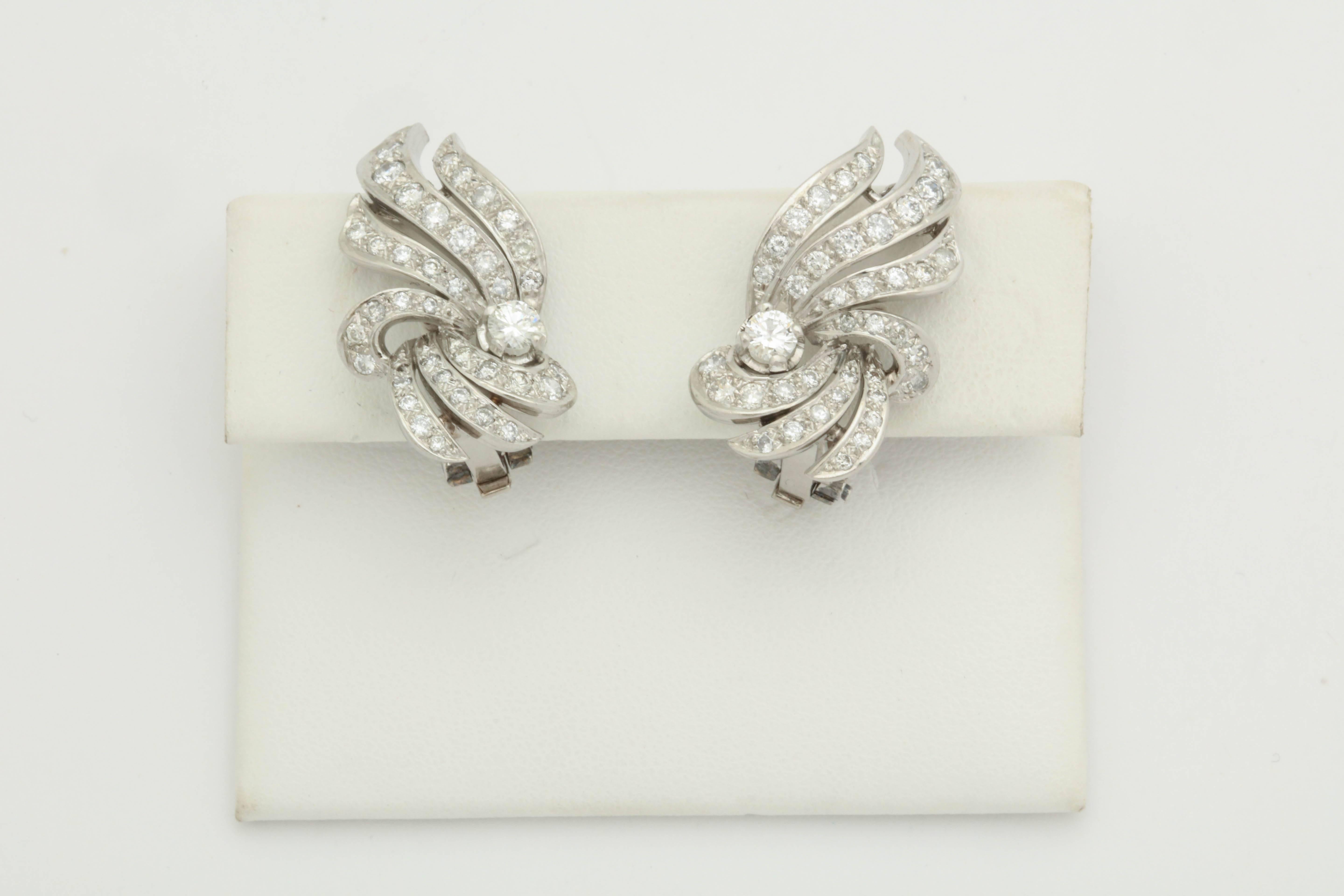 One Pair Of Ladies Flame And Wing Design Earclips With Posts Encrusted With Approximately Two Carats Of diamonds. Made In America In The 1950's.