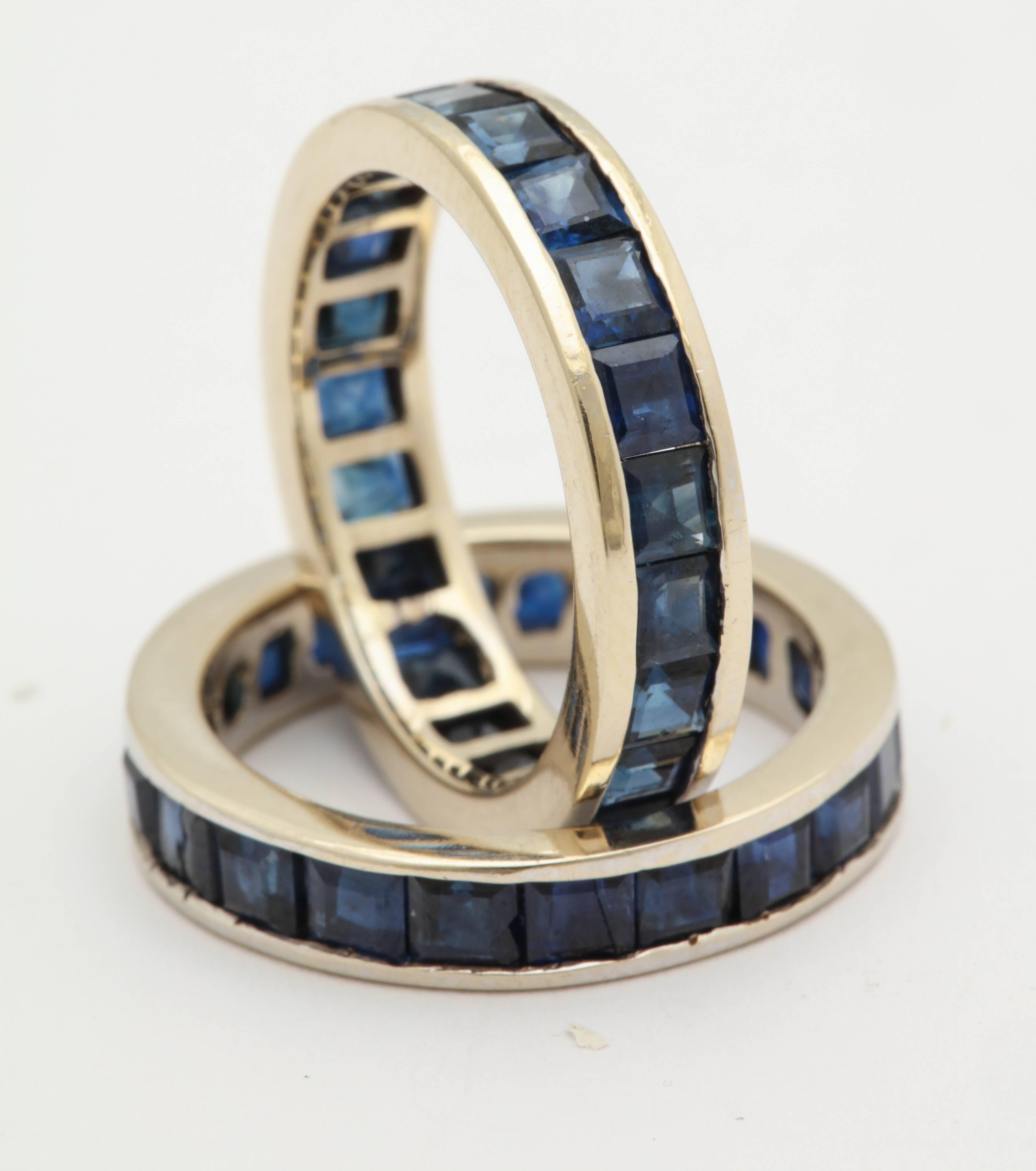 One Pair Of Ladies Deep Blue Color Eternity Bands Size 7 ,Designed With 5 Carats Of Square Blue Sapphires All The Way Around The Bands. Set In 14kt White Gold . 