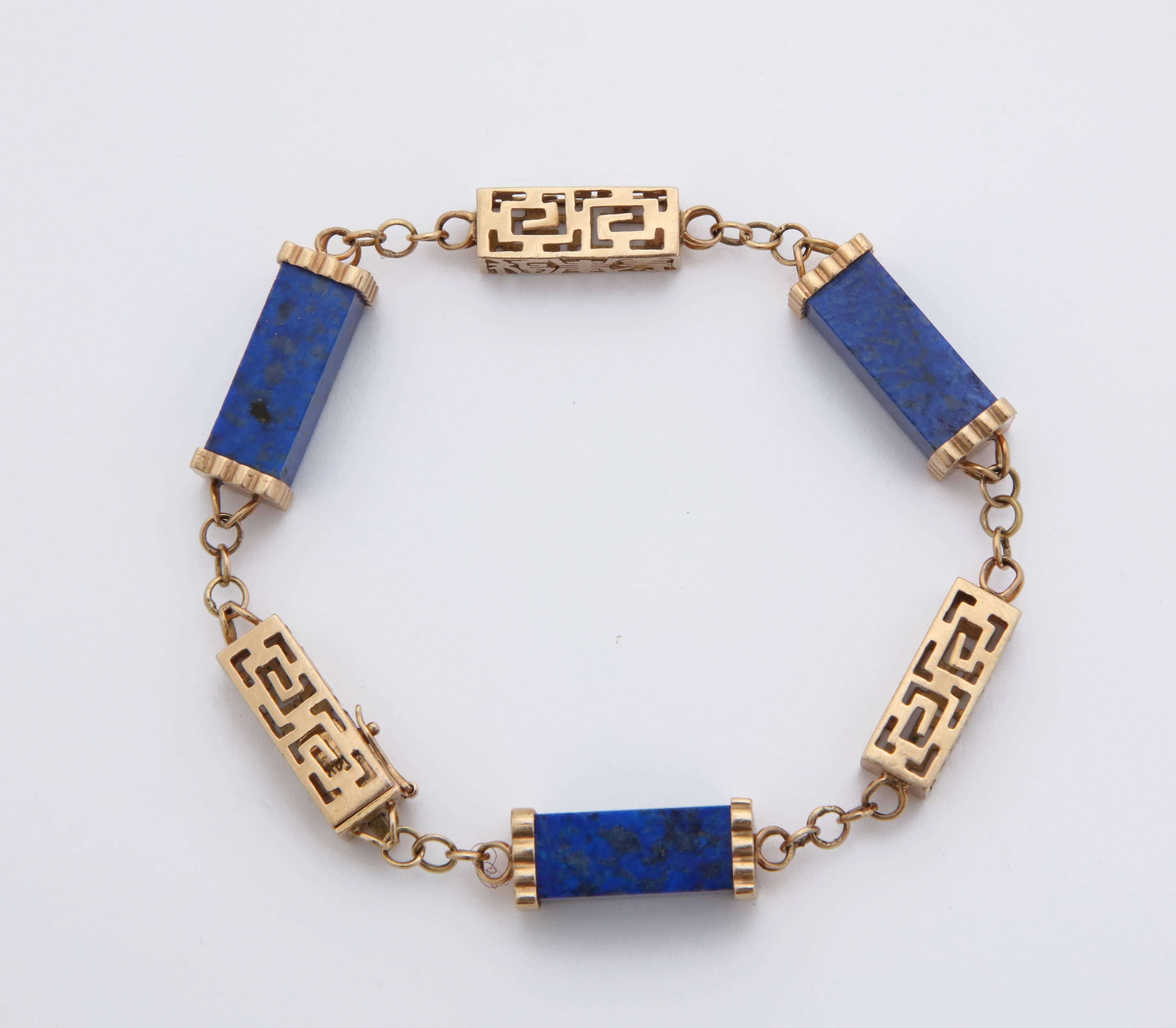 1950s Three Dimensional Cylinder Shape Lapis Lazuli and Reticulated Gold Chain In Good Condition In New York, NY