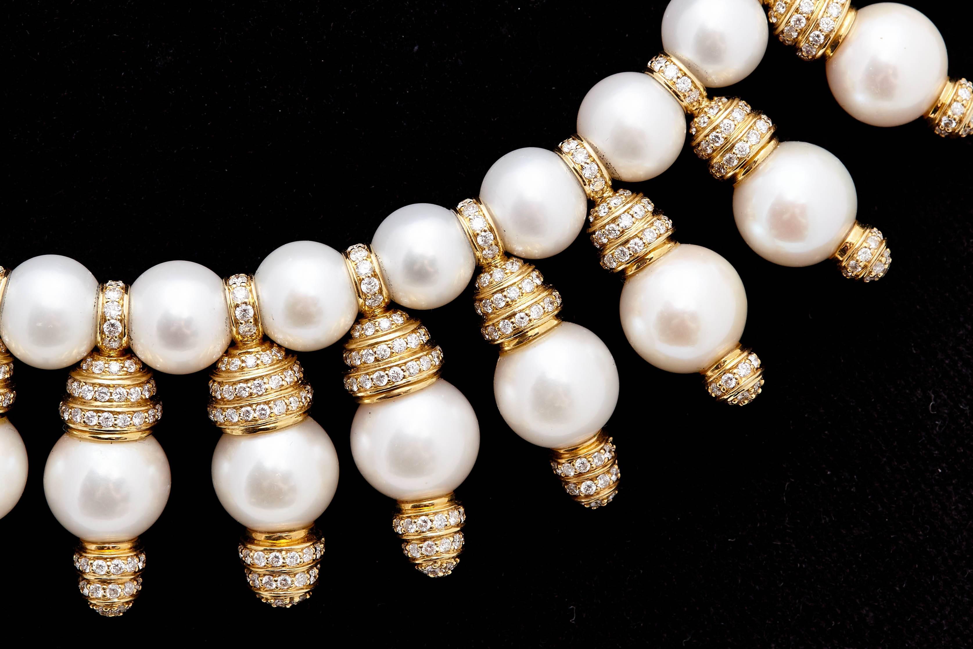 A beautiful necklace in 18K Yellow Gold with Diamonds & Cultured Pearls. Made in Italy. Circa 1980s. The size could be altered and with spare elements, matching ear pendants could be made.