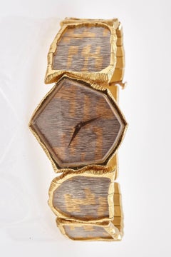 Gubelin, ungewöhnliche Armband-Armbanduhr aus Weiß- und Gelbgold