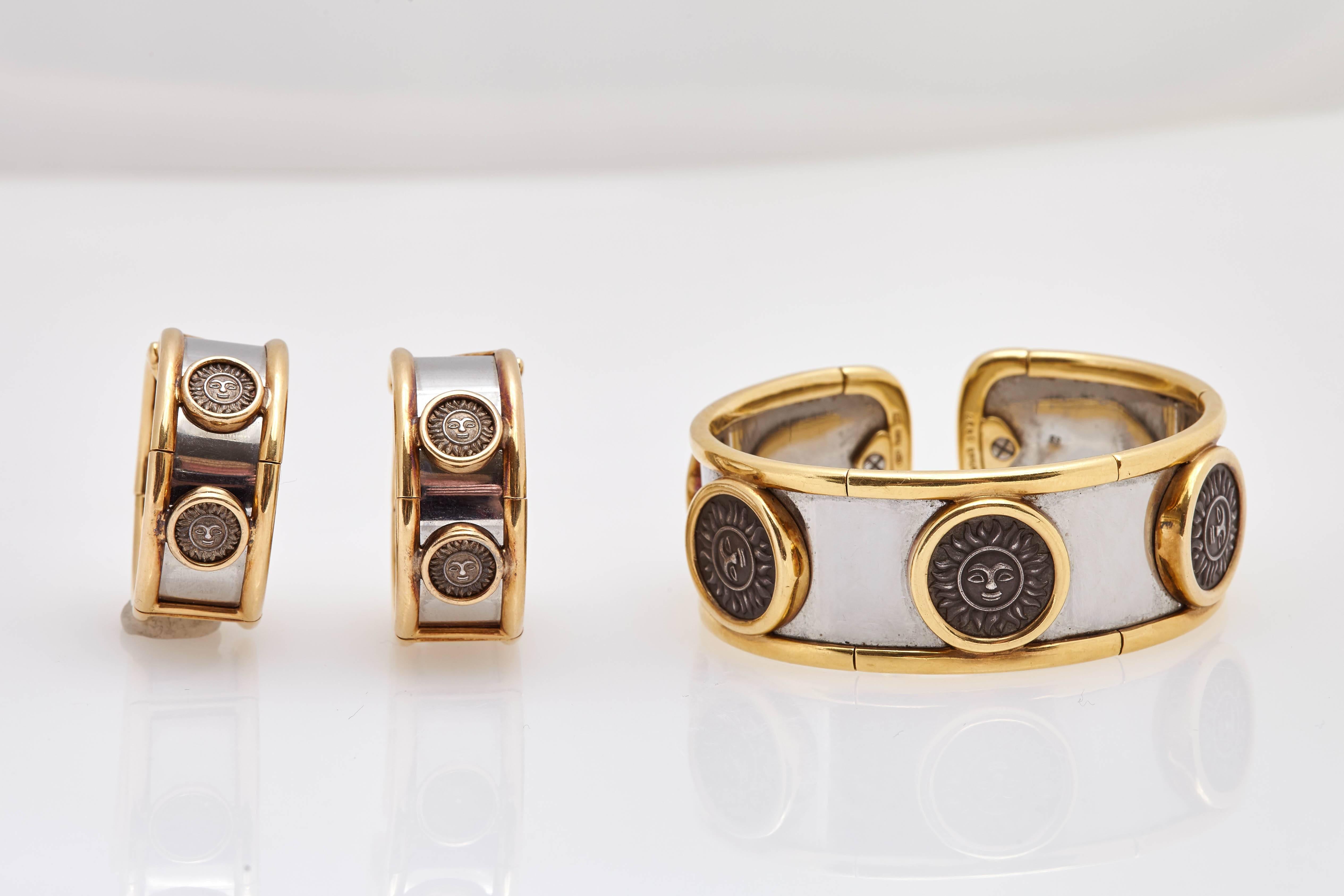 A MARINA B set consisting of Earclips & Bracelet in 18K Yellow Gold & Stainless Steel with Solar Coins made in silver. Made in Italy, circa 1984. 
