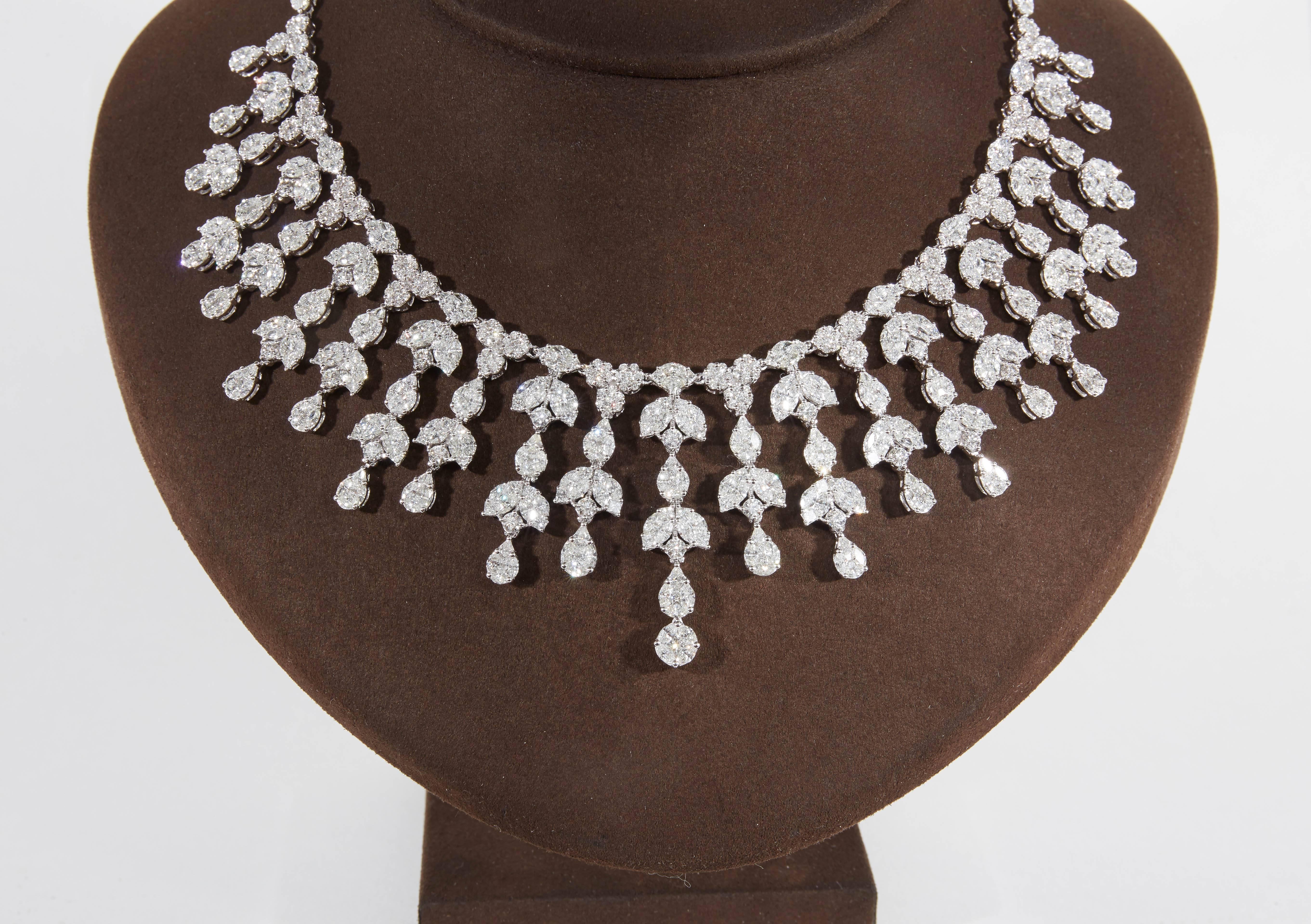 
An important diamond drop necklace. 

31.68 carats of multi shape white diamonds set into round, pear and marquise shapes. 

18k white gold

This necklace was designed maximizes brilliance and look.

17 inch length which can be adjusted. 

The