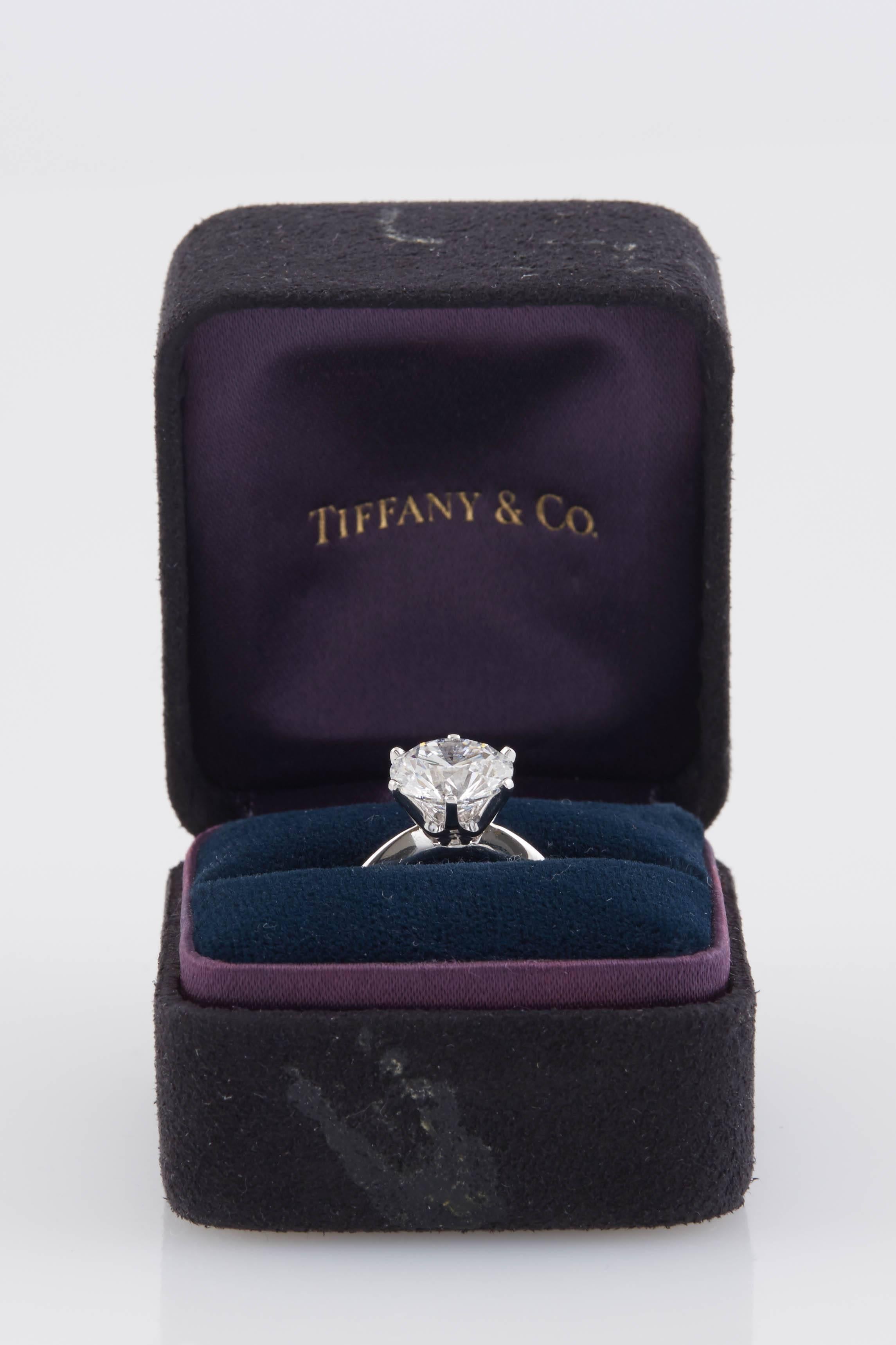 Solitaire engagement ring, finely crafted in platinum in traditional 6 prongs Tiffany and Co setting,   with Round Brilliant cut diamond, weighing 3.04 carat and GIA certified, E Color VVS2 Clarity. Supported by documents from Tiffany & Co.