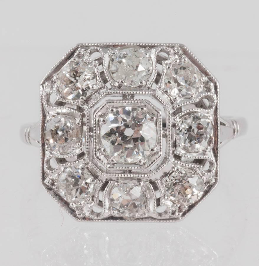 Platinum set Diamond octagonal cluster ring set in 18ct Gold and Platinum
Finger size O