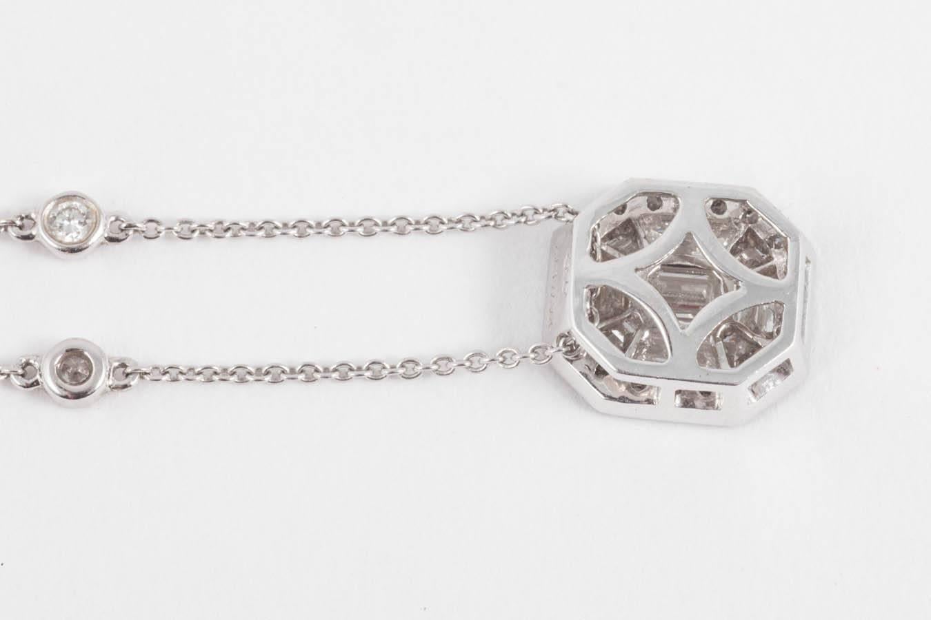 Baguette Cut Diamond Pendant Suspended from a Diamond Chain