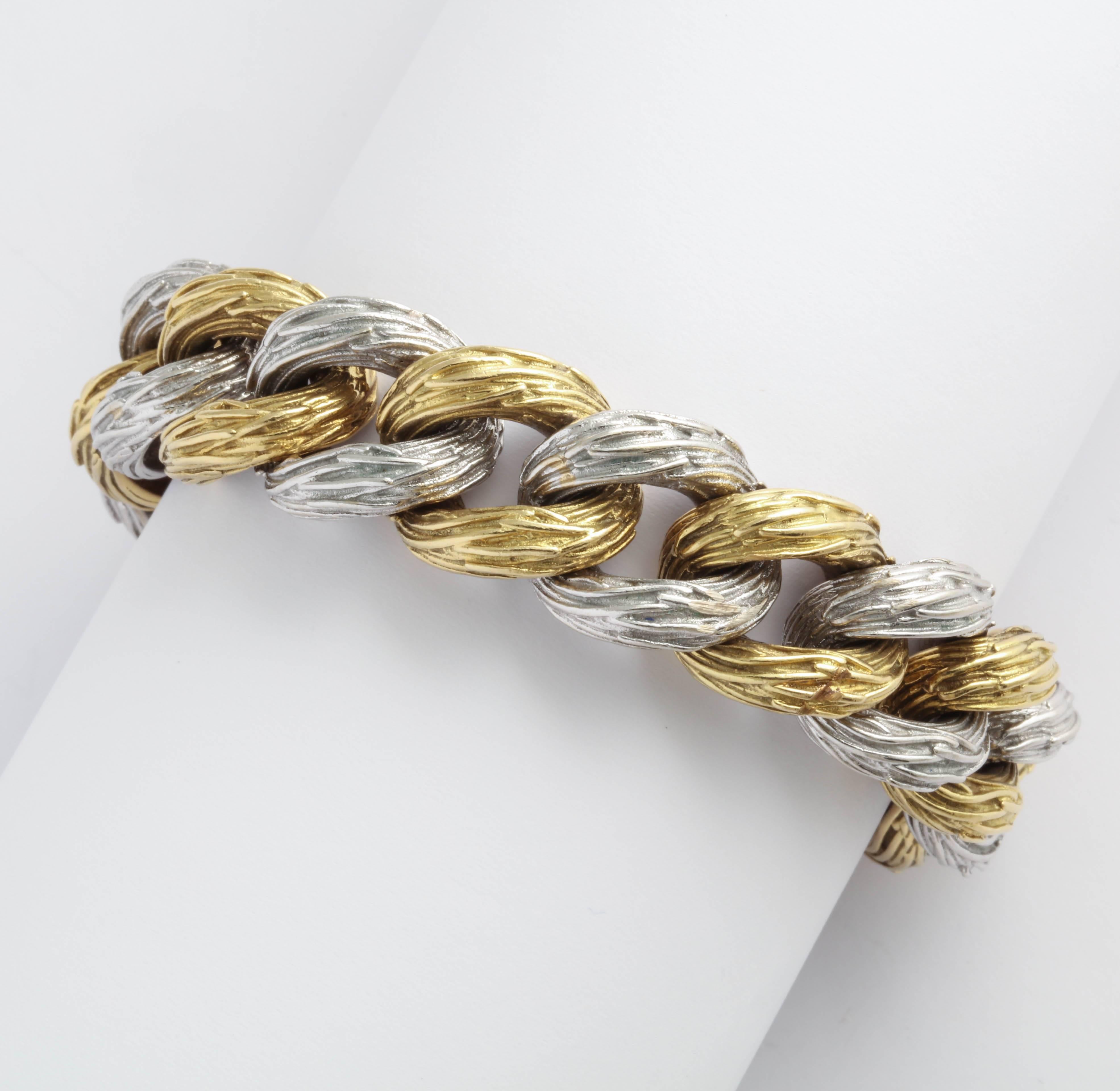 Spectacular 18kt  White and alternating Yellow Gold Bracelet with a sculptural Oval Link and self closing clasp.  SO HOT and CHIC. Very wearable and long enough to be worn by either sex.  Makers Mark - un-identifiable and Italian Control Mark.   SO