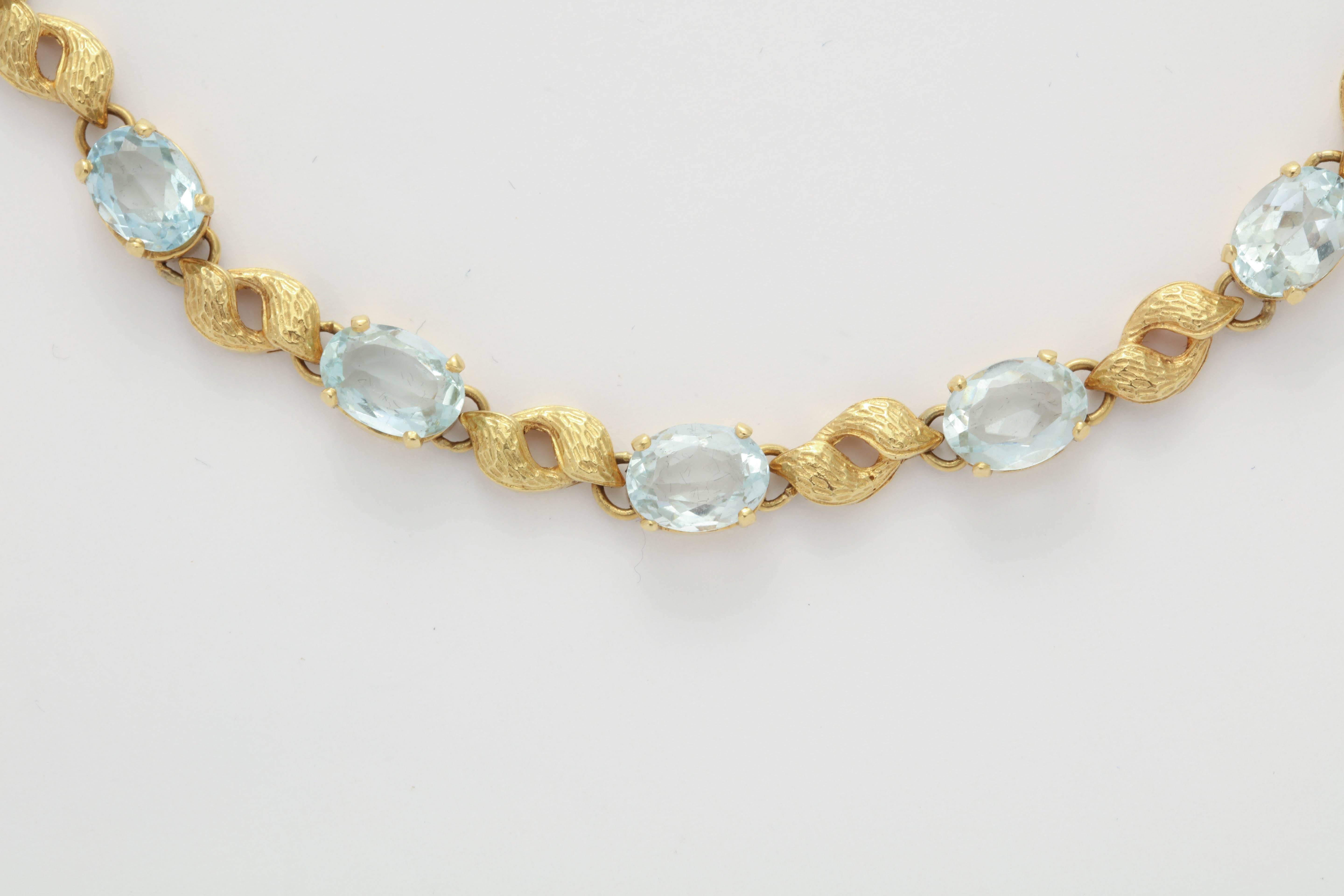 Romantic Alternating Floral Gold Leaf and Faceted Aquamarine Necklace For Sale