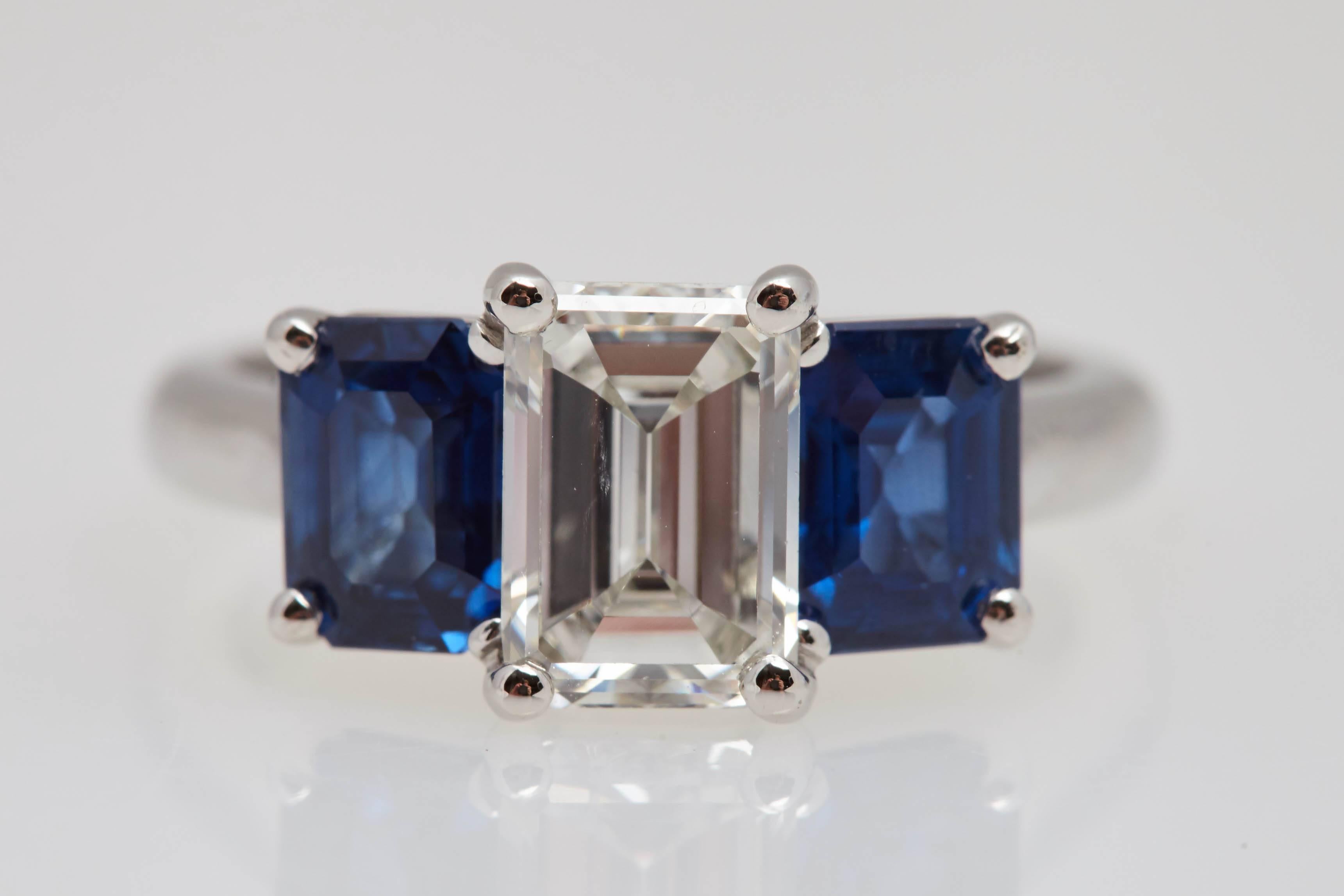 Women's 1.55 Carat GIA Emerald Cut Diamond Side Sapphires Platinum Three-Stone Ring For Sale