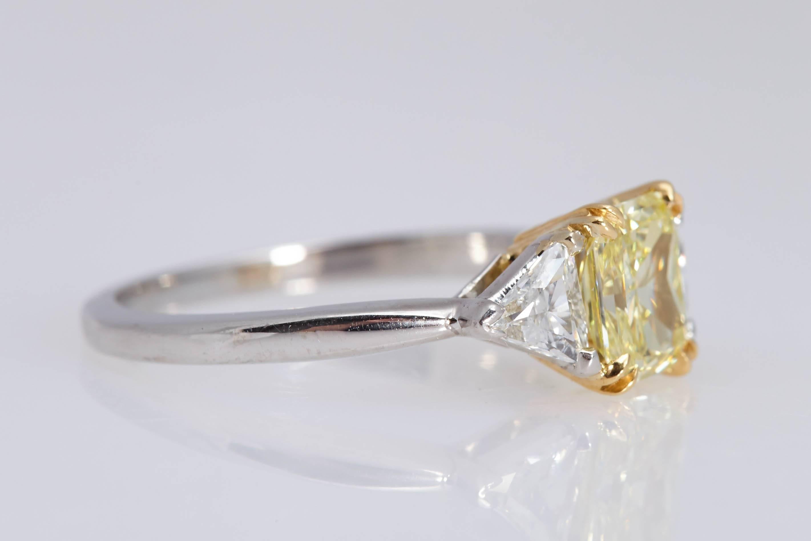 Modern GIA Fancy Yellow Radiant Diamond .97 Carat Platinum 18 Karat Yellow Gold Ring For Sale