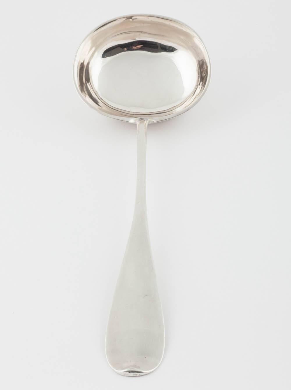 A 19th century silver soup ladle of classic design by one of Russia's best silversmiths, Khlebnikov of Moscow, from the Romanov era made during the reign of Tsar Alexander II

11 in. (27.9 cm.) long. 

Fully hallmarked with the imperial warrant of