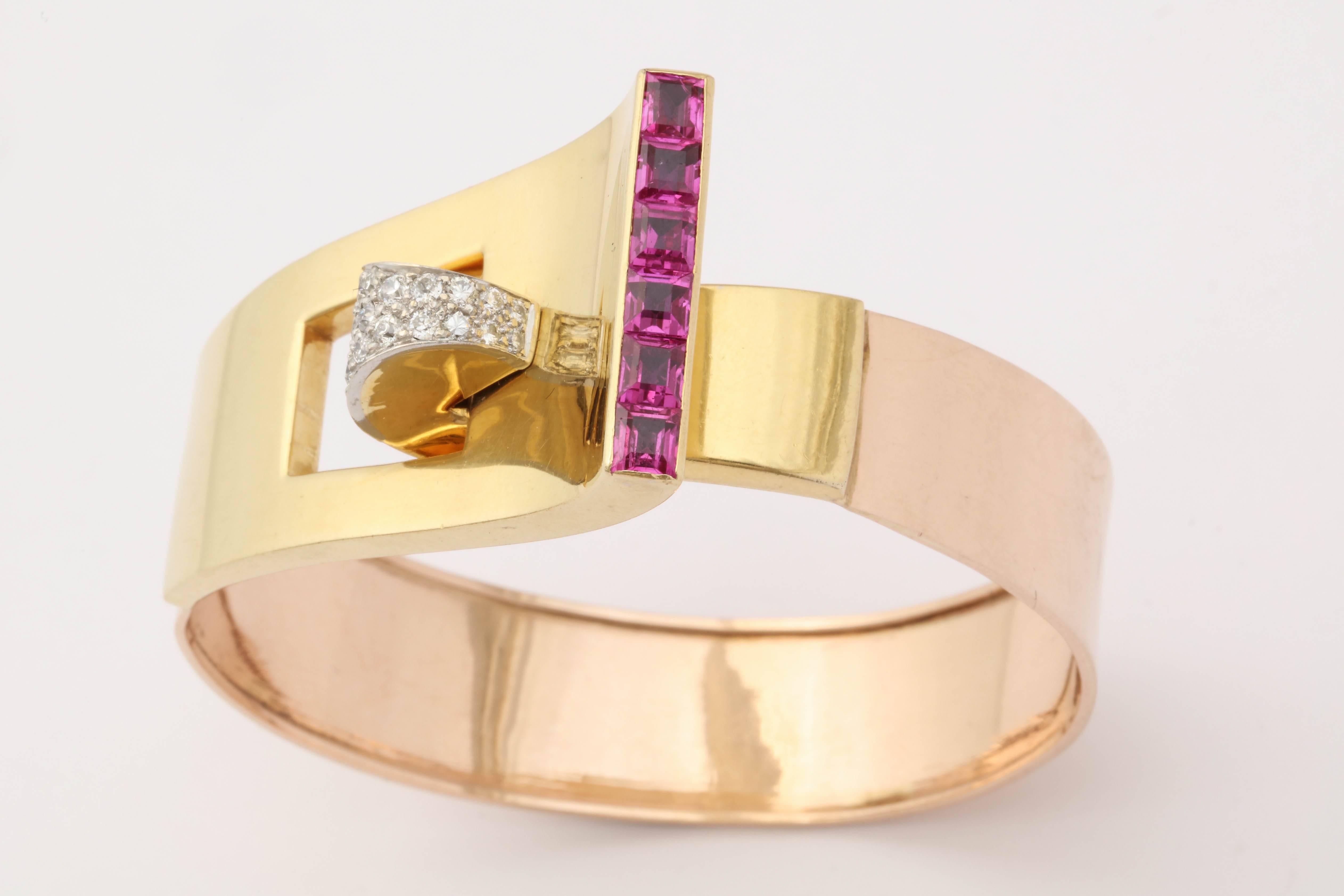 One Ladies Cuff Bangle Bracelet Designed In High Polish 14kt Pink Gold And 18kt Yellow Gold In The Form Of A Belt Buckle. Bracelet Is Embellished With Six Rectangular Shape Square Cut Pink sapphires Weighing approximately 1.50cts. Further