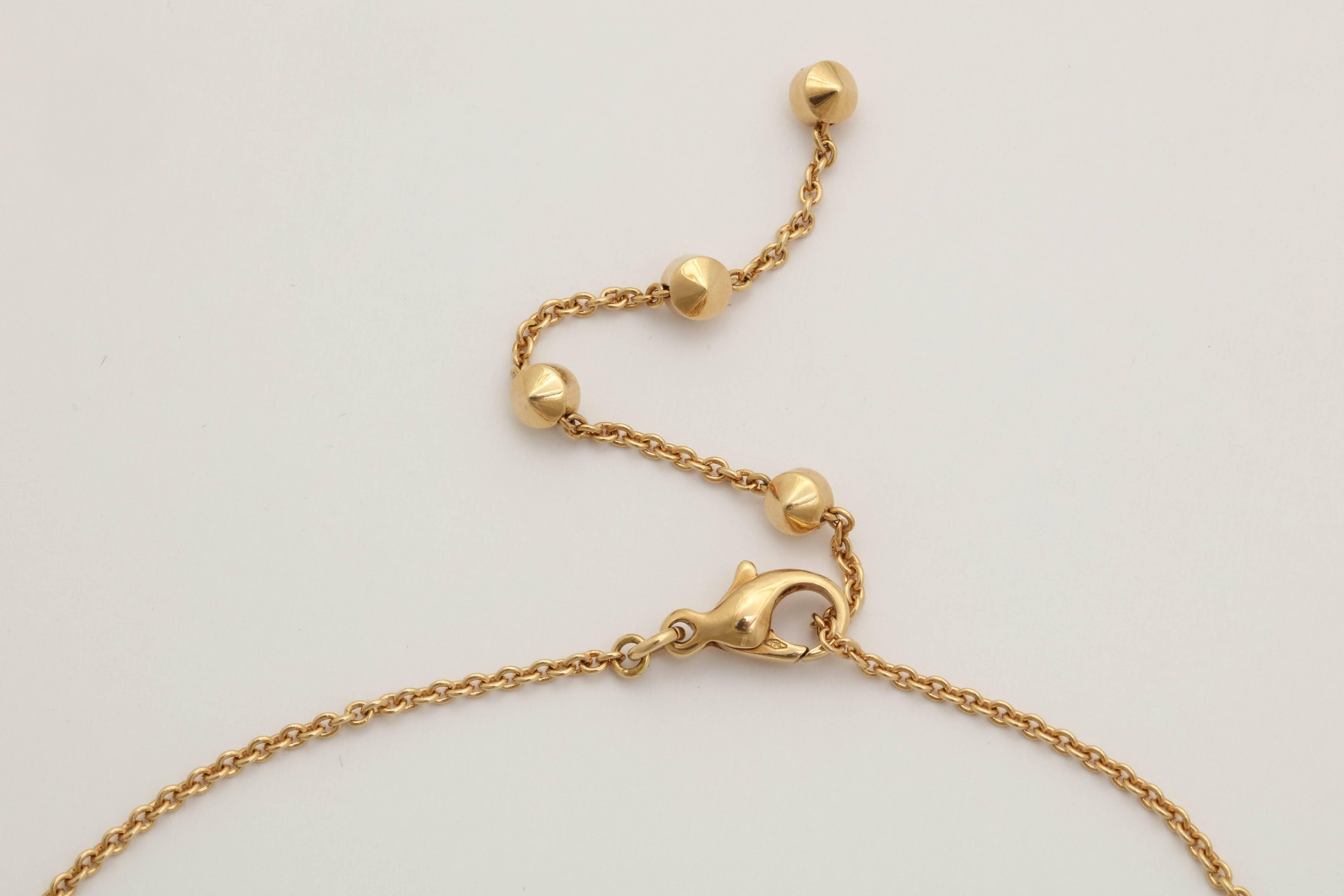 Bulgari 1980s Sugarloaf Buff Cut Garnet and Asymmetrical Disc Gold Necklace 1