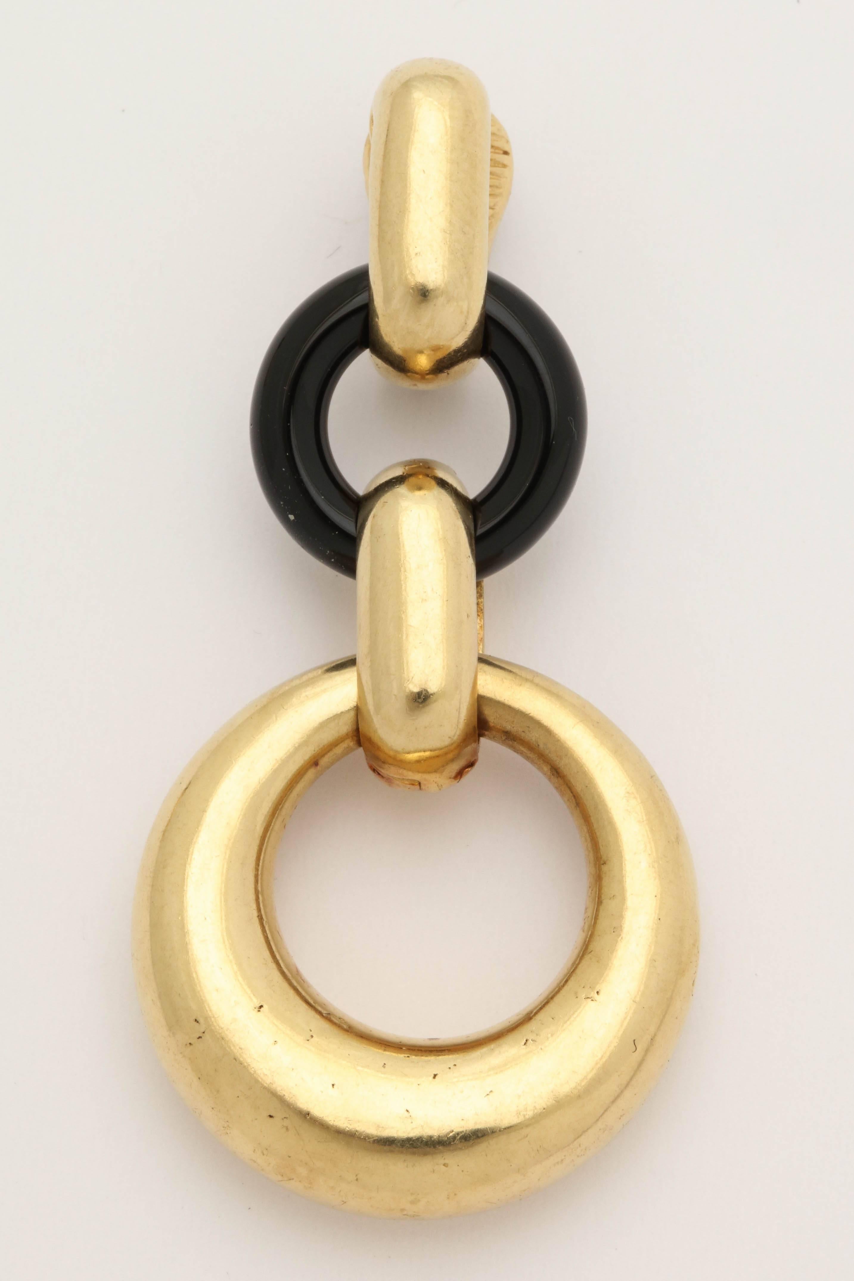 One Pair Of Ladies 18kt High Polish Gold Loop Link Hanging Earrings Intertwined With Two Custom Cut Open Link Onyx Stones.Made In America In The 1960's With Fancy High Quality Clip On Backs. NOTE: Posts May Be Added For Pierced Ears.