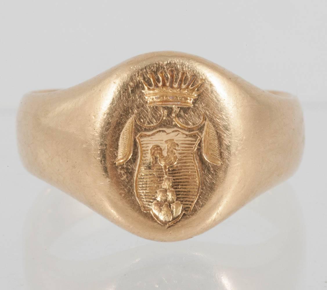 This 18ct Gold Signet ring is engraved with a Coronet and Cockerel. denoting aristocratic connections
Finger size S 1/2