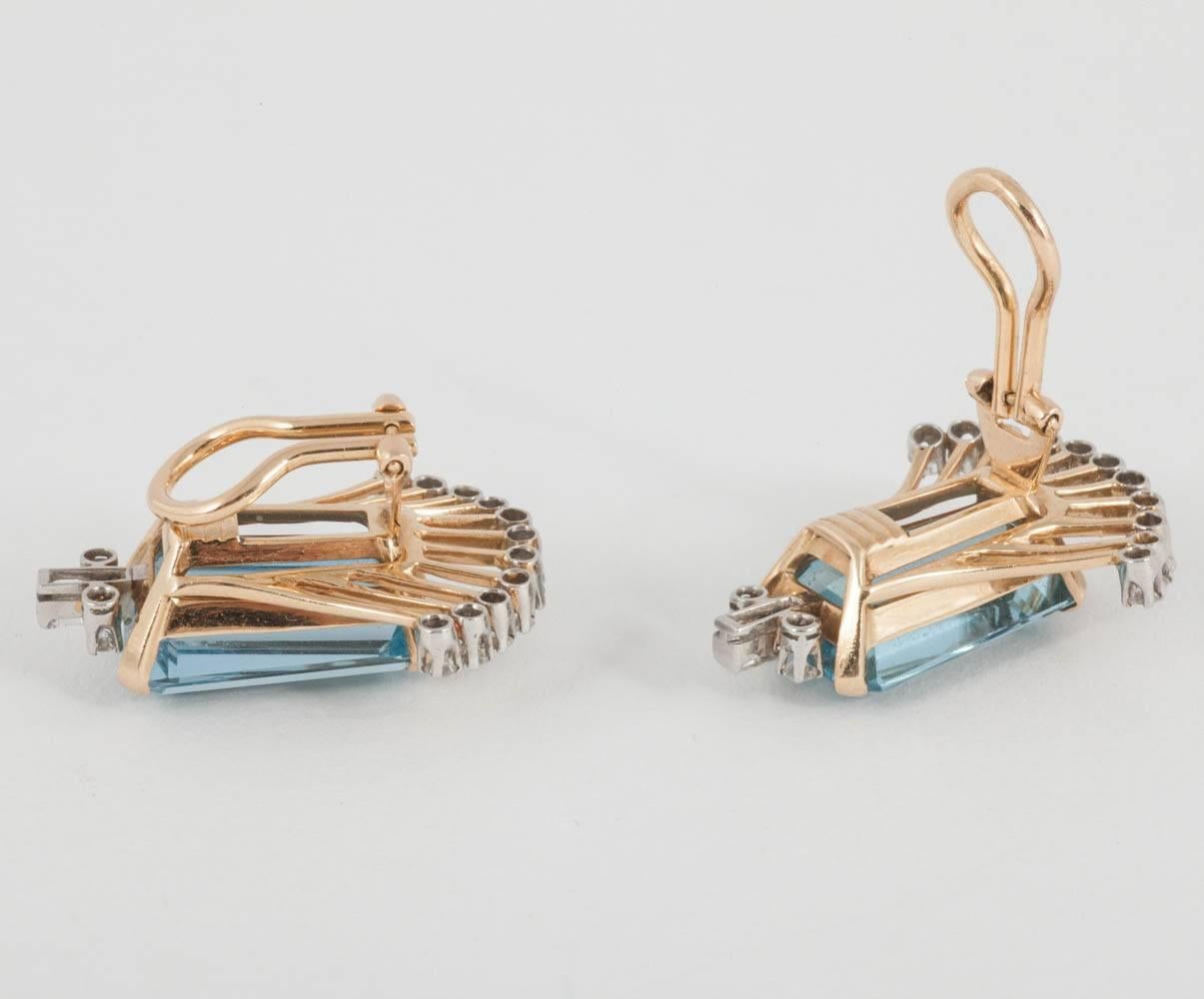 These stylish earrings are from 1960's and have kite shaped aquamarines enhanced by Diamonds/ Set in 18ct Gold
1.2cts of Daimonds