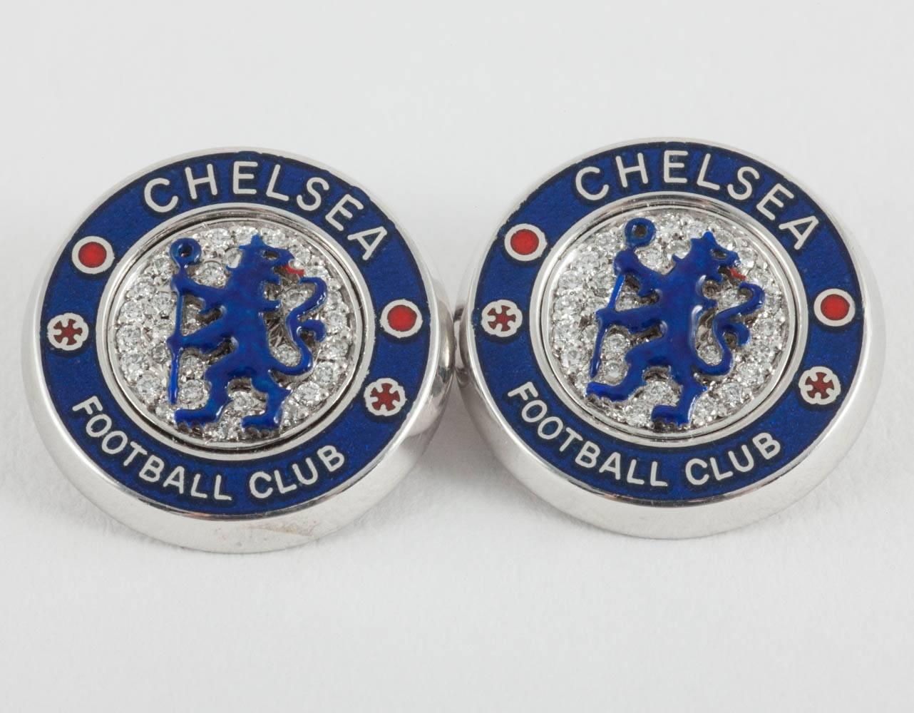 A modern pair of heavy, 18 carat white gold mounted double sided cufflinks of Chelsea Football Club. Circular in shape, finely detailed and set with brilliant cut diamonds together with the red and blue enamel of the clubs colours. Chain link