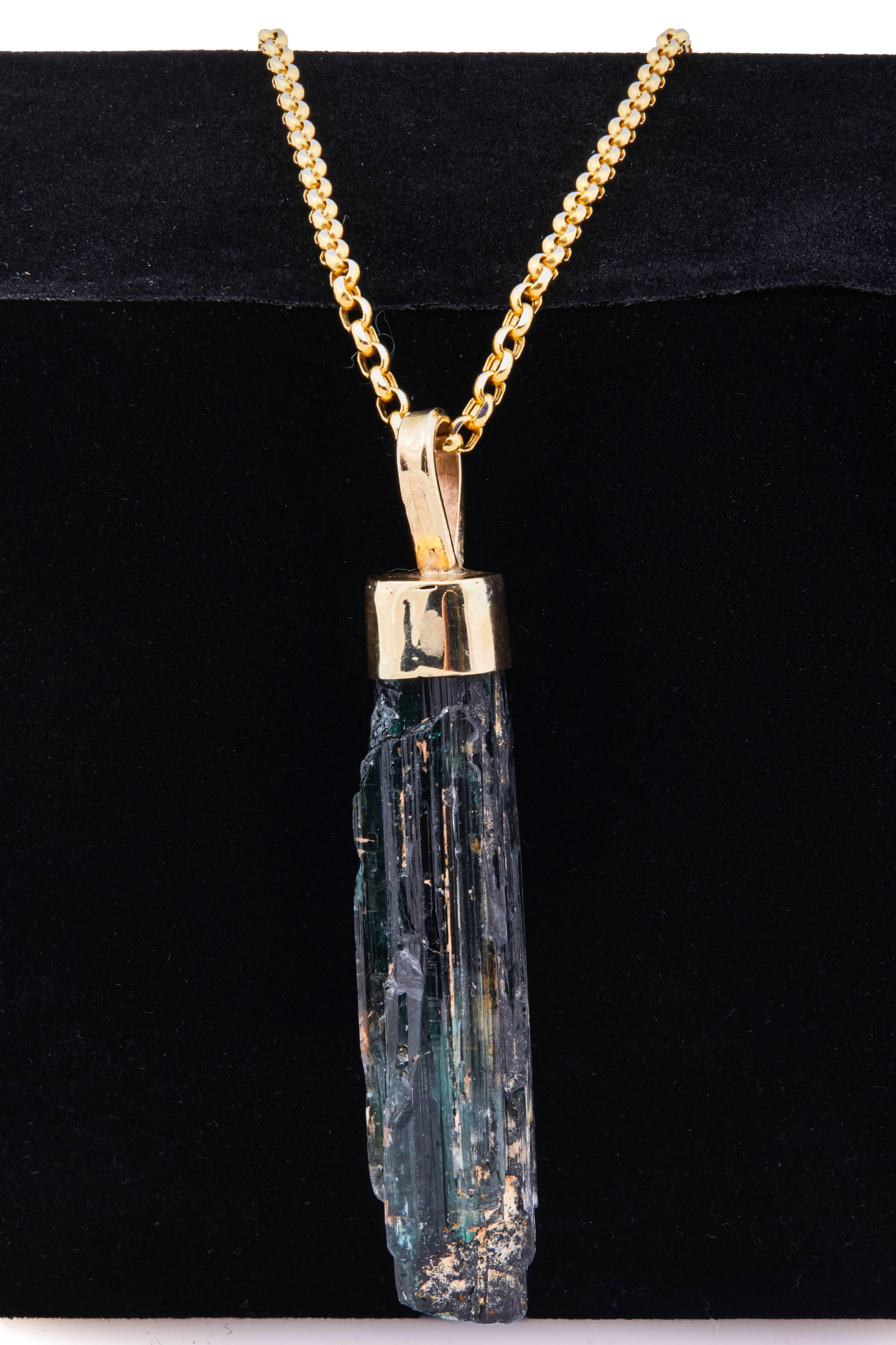 Necklace with natural tourmaline mounted in 18k gold. Italian 18k gold chain is 24