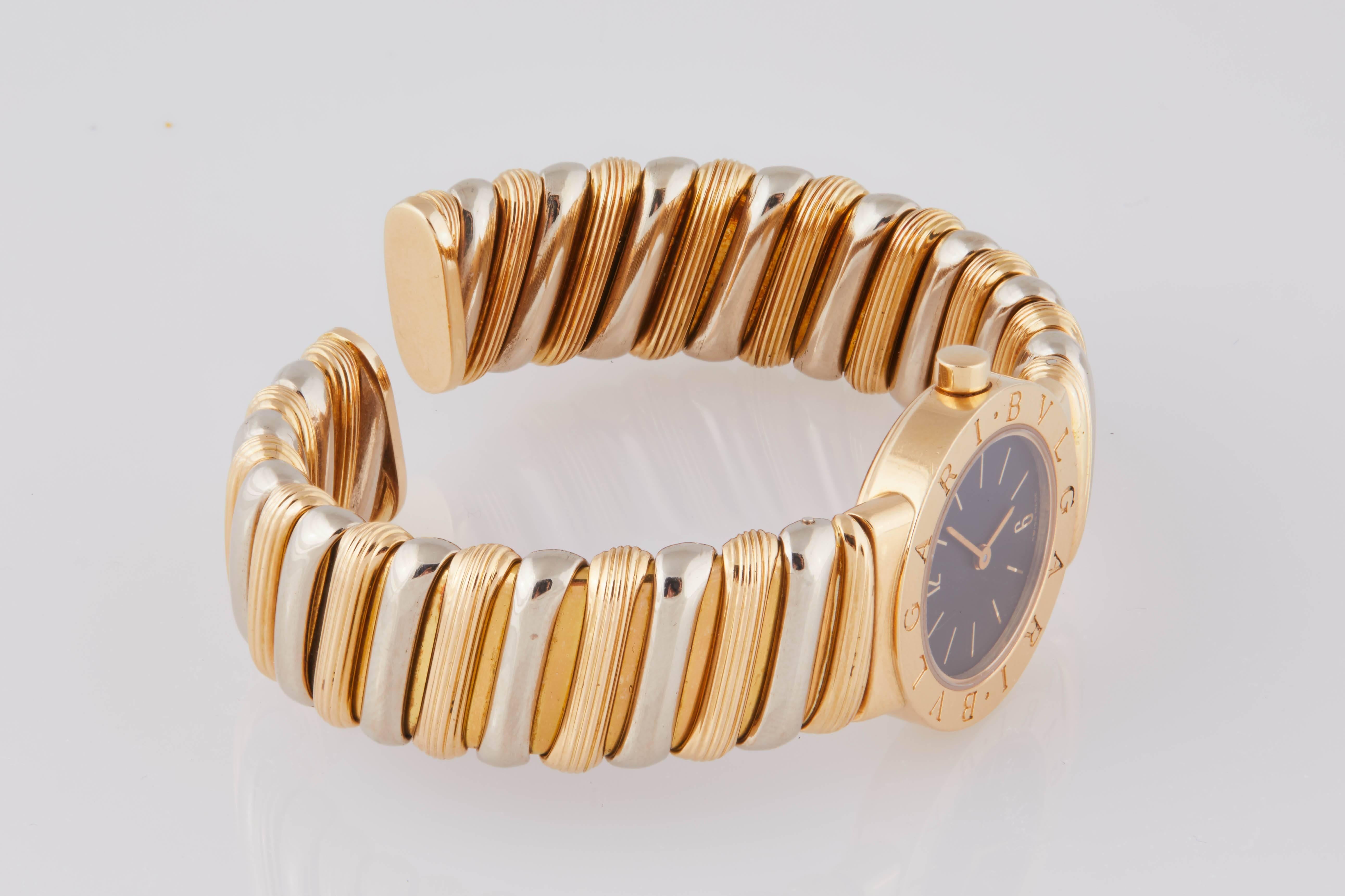 1980s Bulgari Tubogas Women's 18 Karat Gold Cuff Watch with Black Dial In Excellent Condition In Chicago, IL