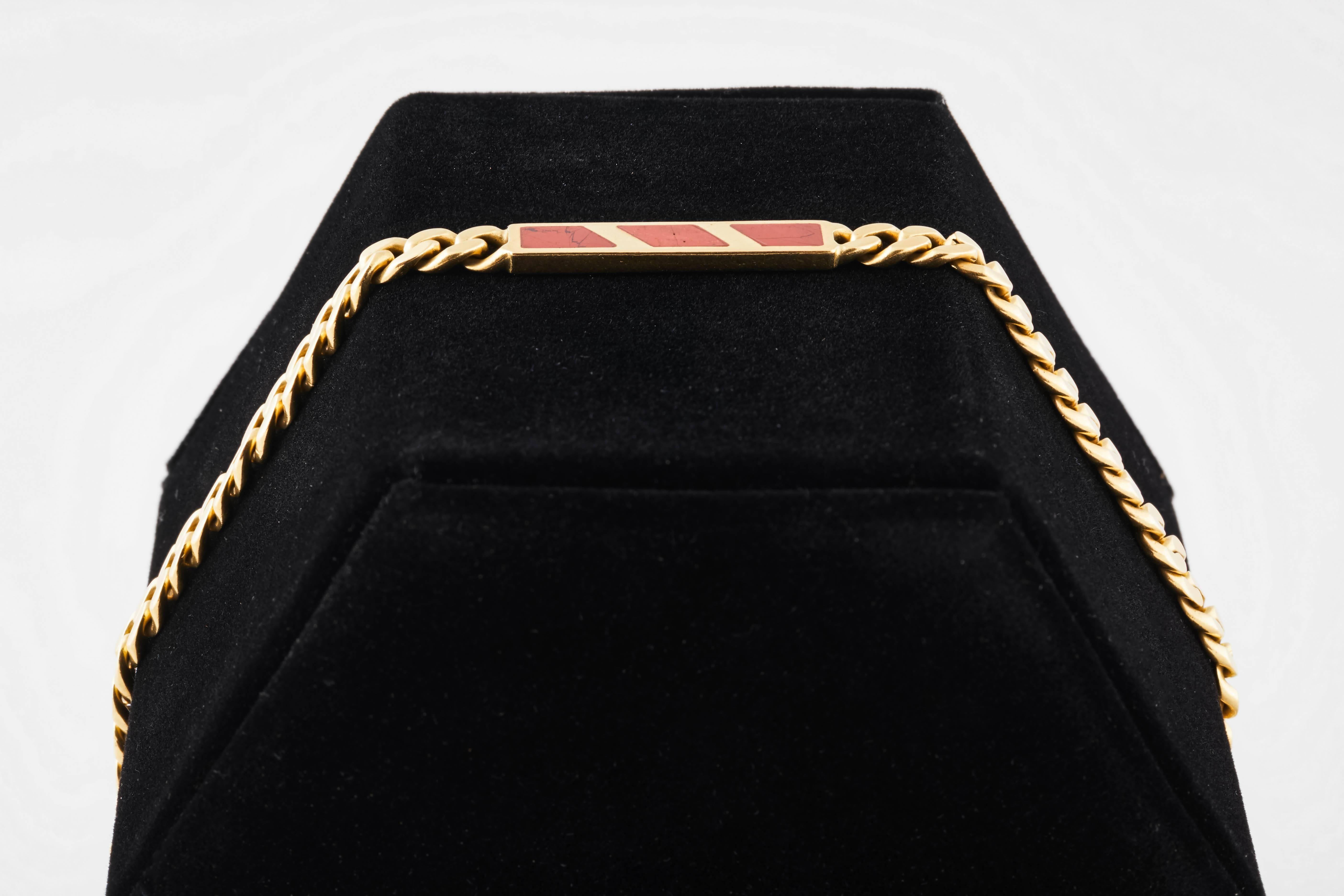 1970s Bulgari signed 18k gold and carnelian ID bracelet in its original length. Carnelian bar is just over 1