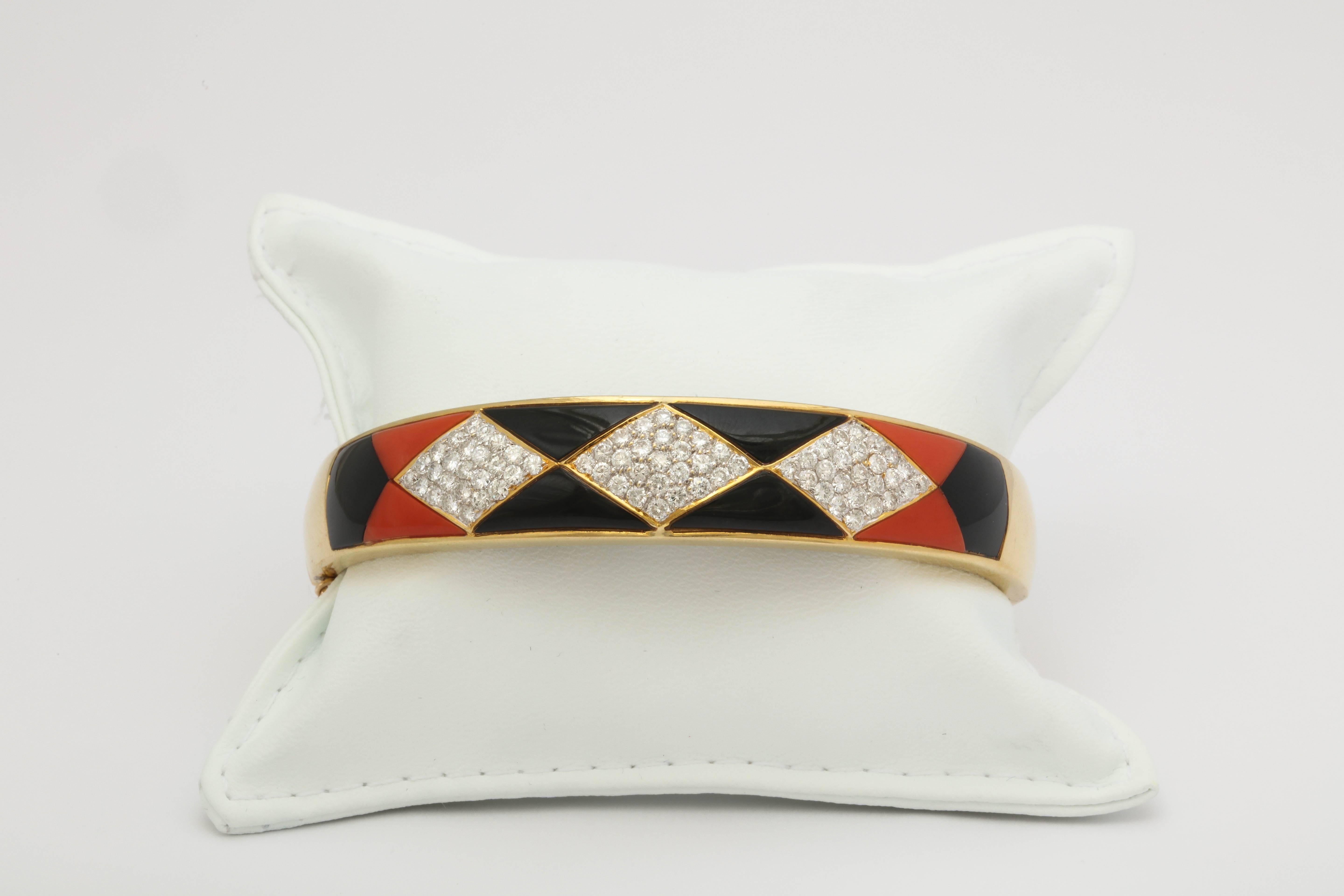 1970s Horizontal Marquise Cut Onyx, Diamond and Coral Custom Cut Bangle Bracelet In Excellent Condition In New York, NY