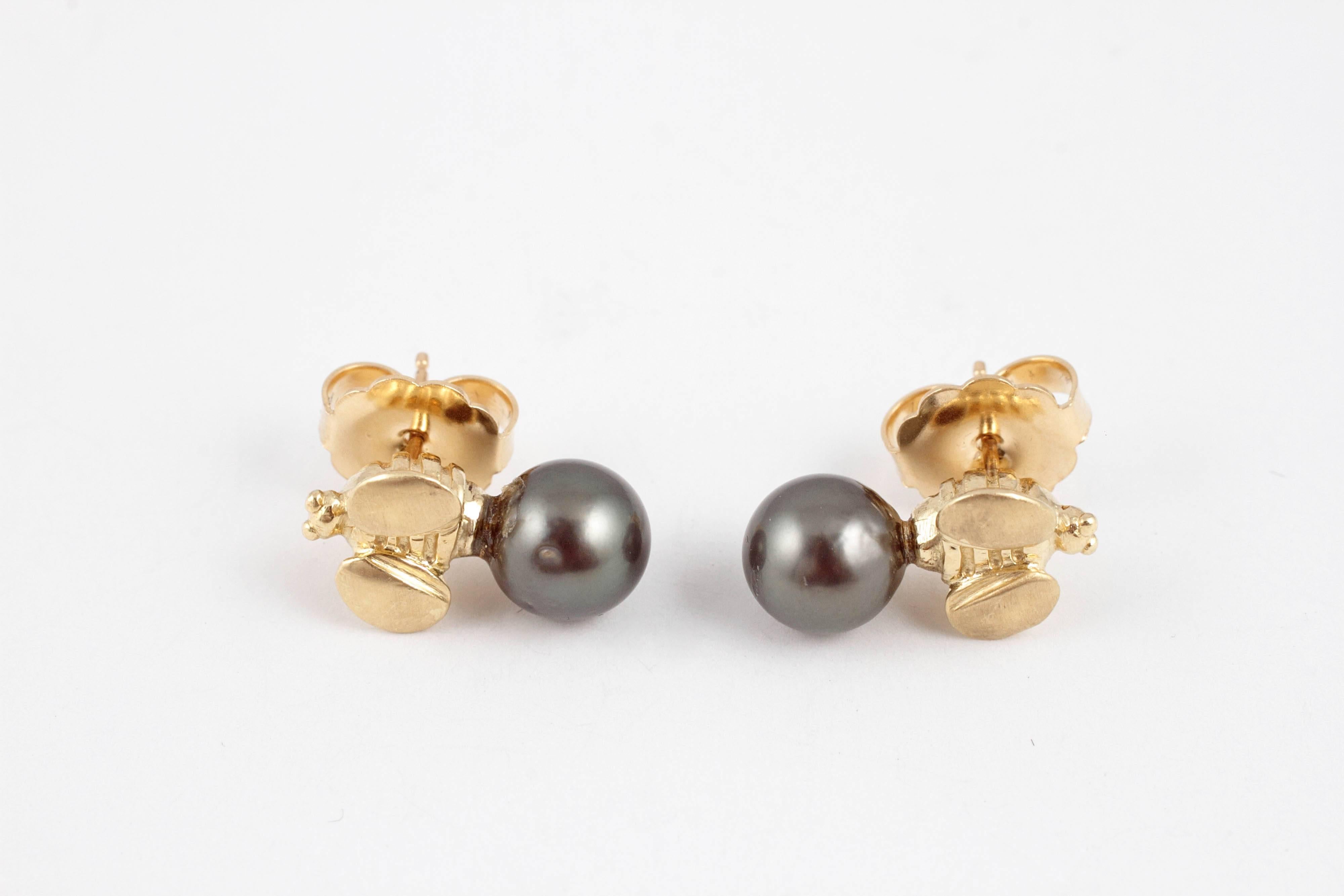 Whimsical and fun --  for the bee lover!  These pearls are stated to be Tahitian.  They measure 7.75 mm and are beneath 18 karat yellow gold bee forms, secured with over-sized backs.