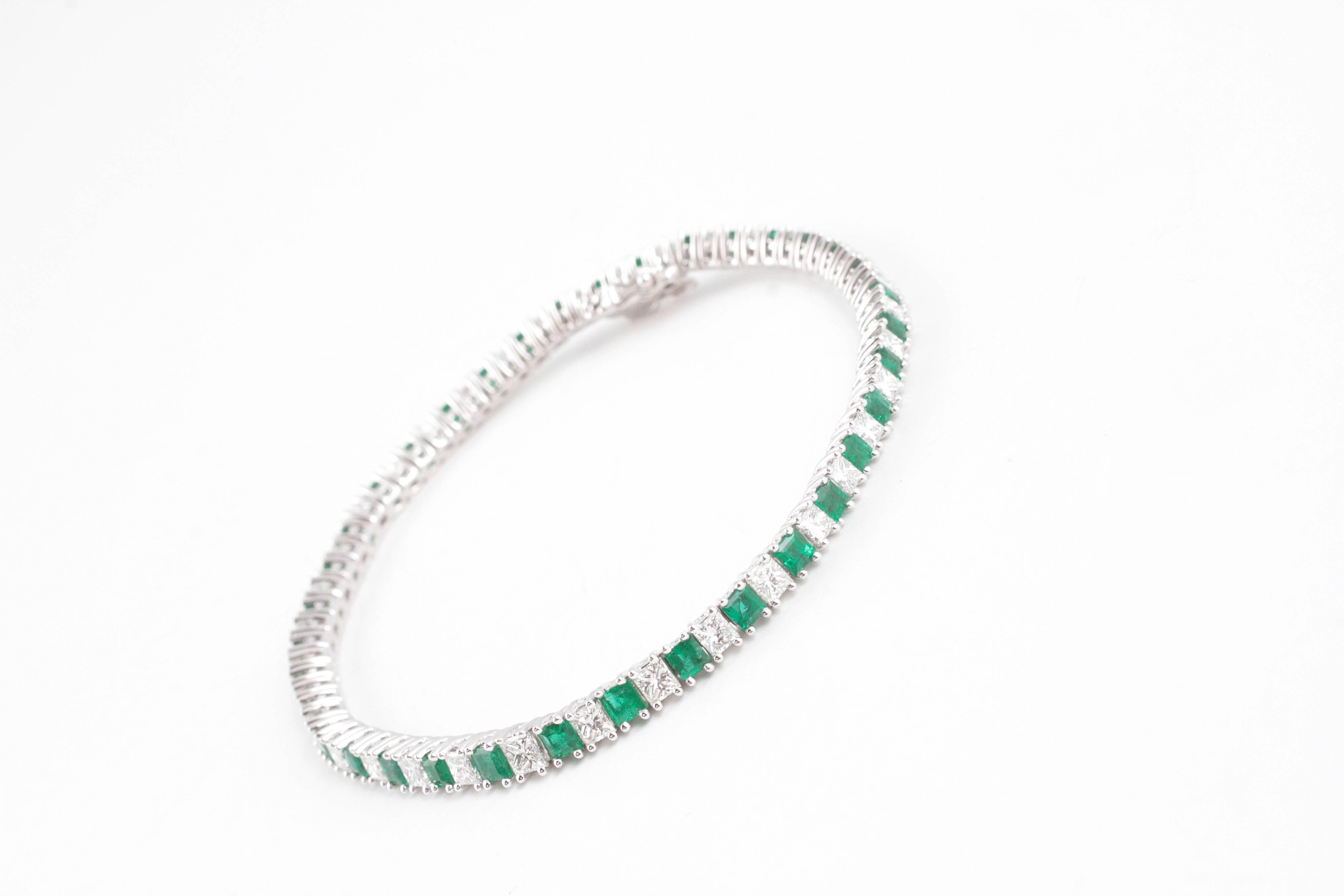 What a show stopper in platinum!  This fabulous bracelet would compliment any arm!  With 2.55 carats of bright green emeralds and 3.75 carats of sparkling diamonds - wouldn't you like to find this in a little box under the tree? 
