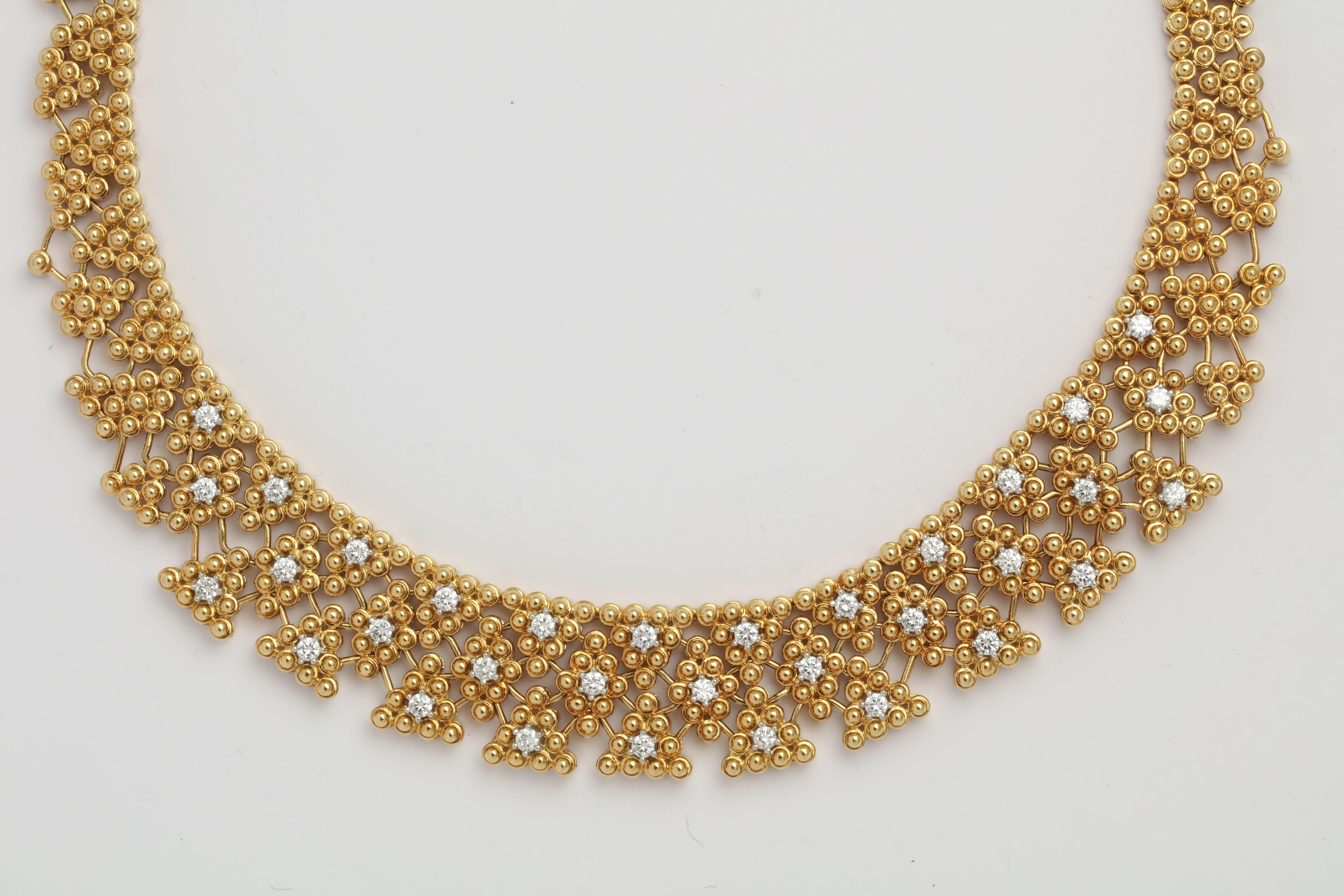 Magnificent 18kt Yellow Gold Necklace woven into a Collar.  Very regal without being overstated. Lays beautifully.  Center section is set with 33 full cut clean white Diamonds - set in Platinum. 