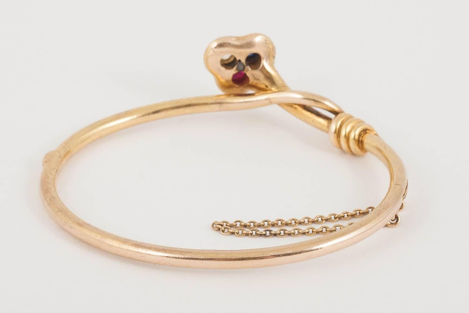 Women's Cross-over 18 Carat Gold Bangle with Diamond, Ruby, Sapphire, English circa 1890 For Sale
