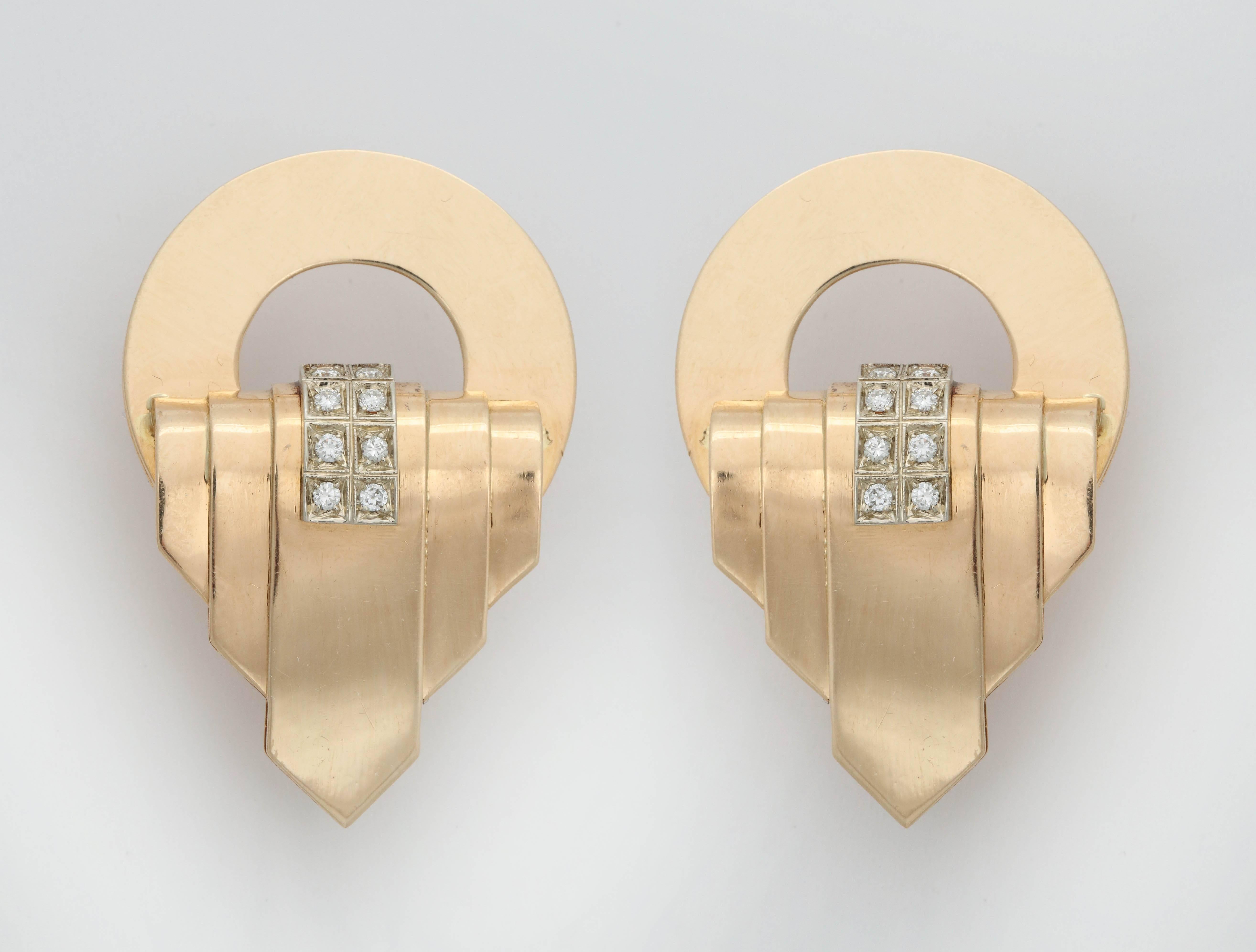 One Pair Of Ladies 18kt Yellow Gold Large Architectural And Geometrical Design Earclips With A Circular Design On Top And Chrysler Type Art Deco Design On Bottom Of Earrings.Earrings Further Created with Sixteen Full Cut Diamonds Weighing