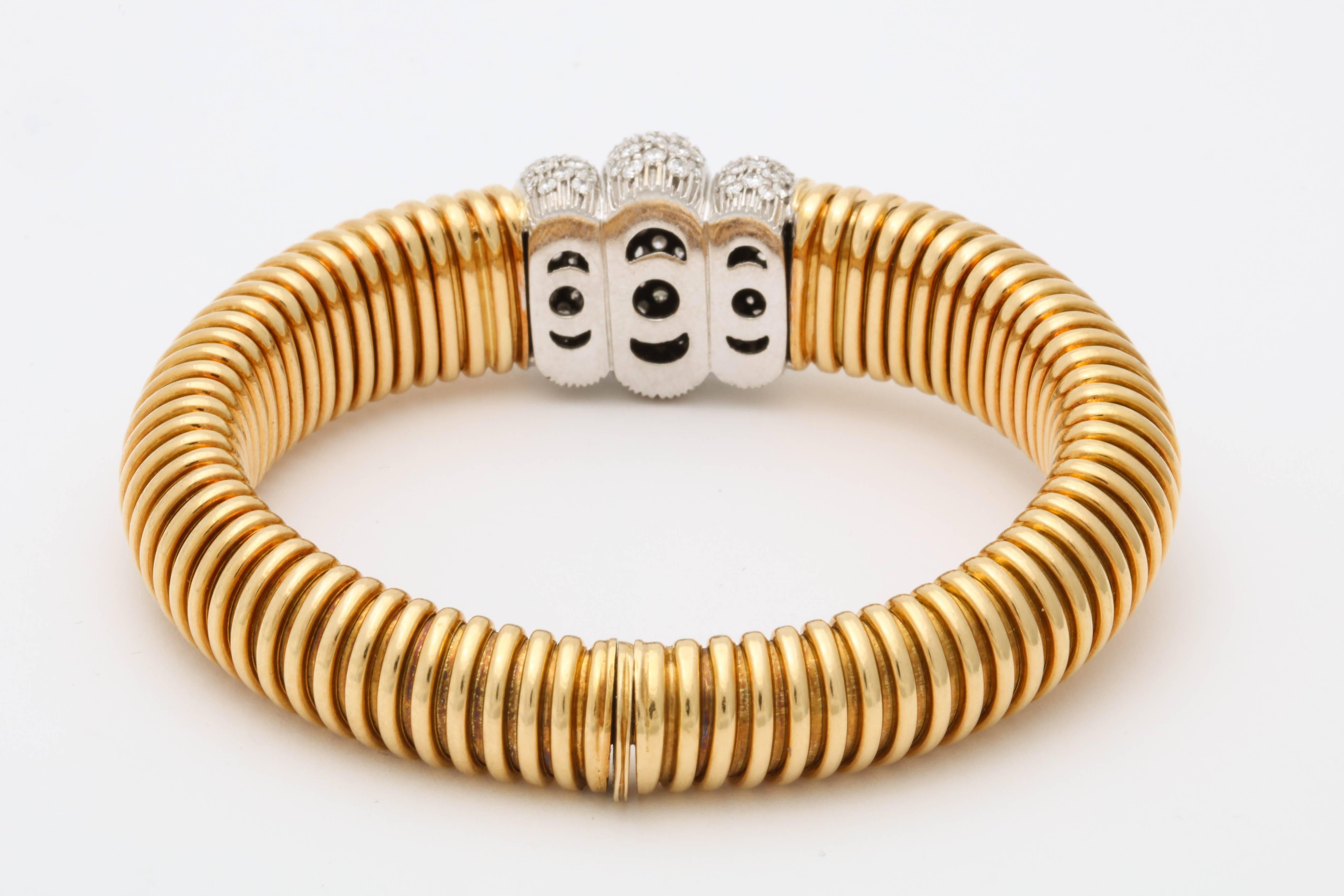 1980s Flexible Tubogas Snake Diamond and High Polish Ridged Gold Bracelet In Excellent Condition In New York, NY