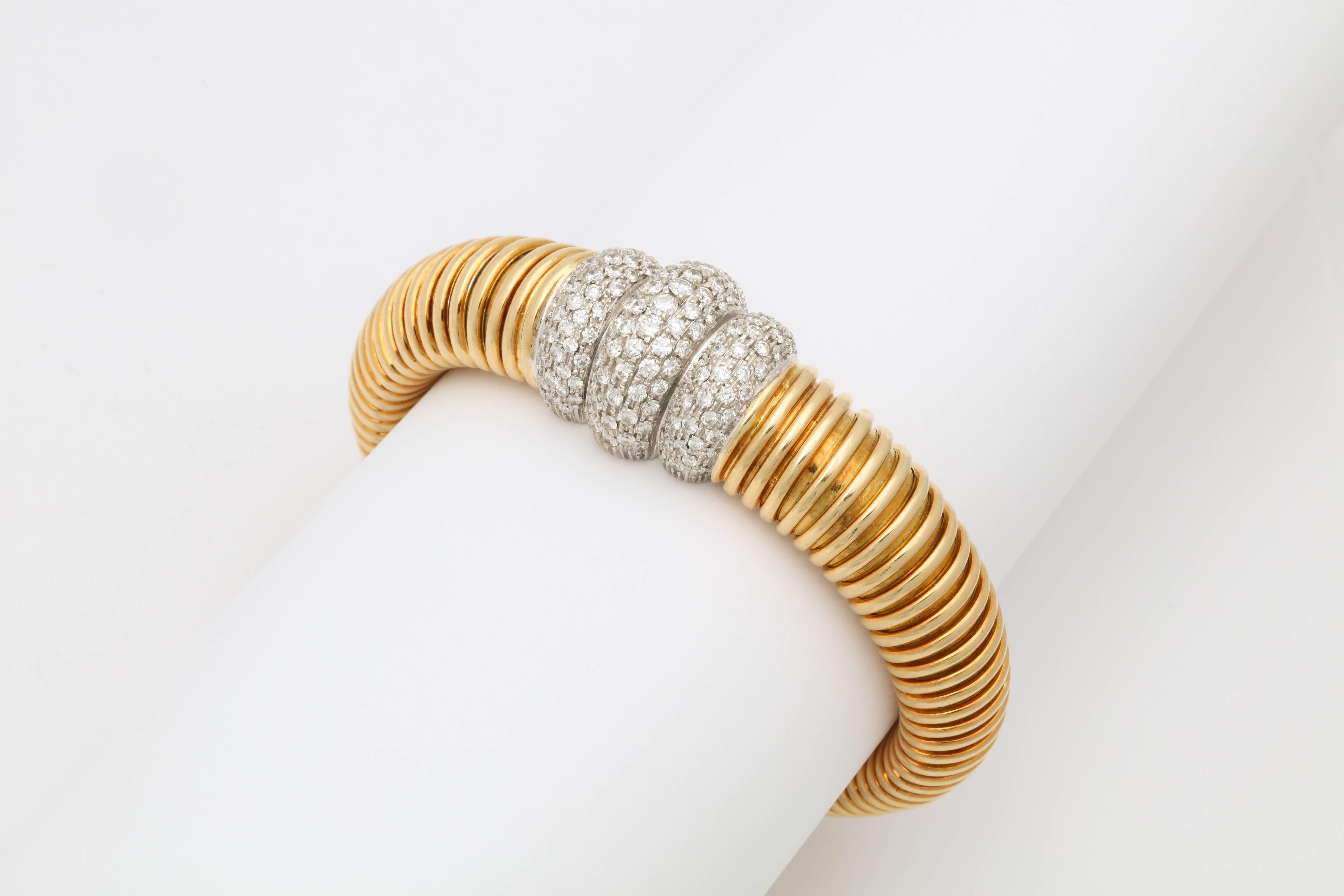 1980s Flexible Tubogas Snake Diamond and High Polish Ridged Gold Bracelet 1